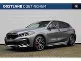 BMW 1-serie 120i High Executive M Sport Automaat / Panoramadak / Trekhaak / 	Adaptieve LED / Active Cruise Control / M Sportstoelen / M Sportonderstel / Comfort Access