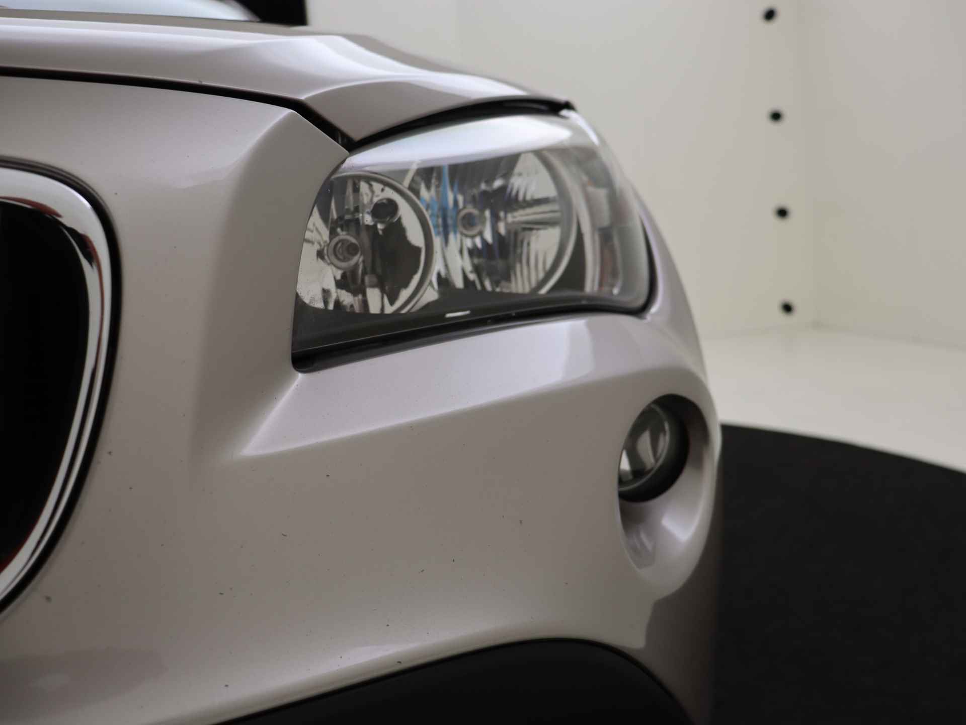 BMW X1 sDrive18i Automaat | Airco | Lichtmetalen velgen - 12/25