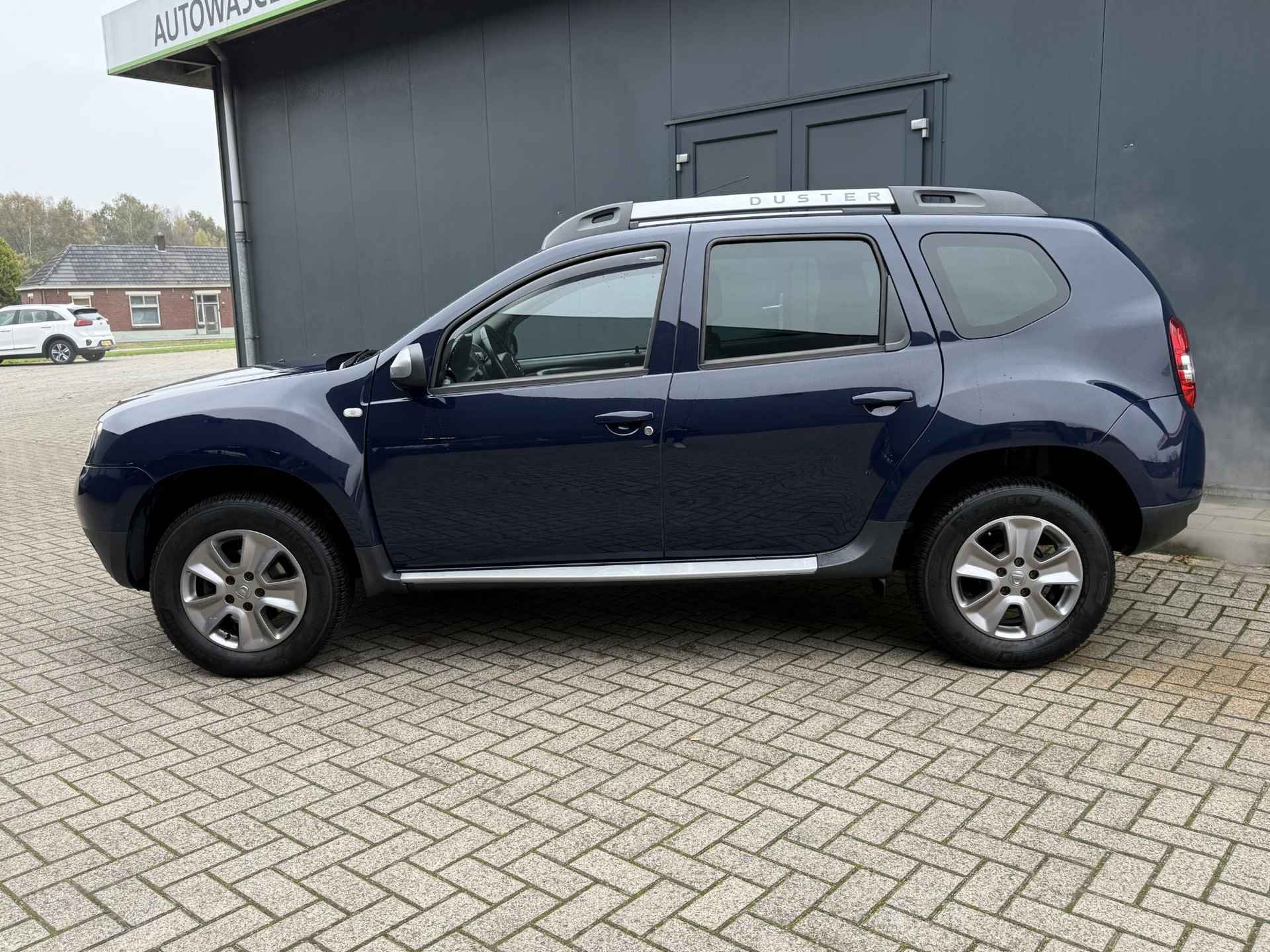 Dacia Duster 1.2 TCe 4x2 Lauréate / Trekhaak / Cruise Control / Airco / All-Season banden /  Bluetooth / set Winterbanden - 8/35