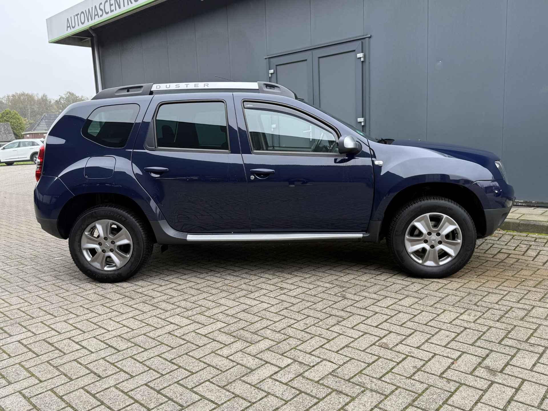 Dacia Duster 1.2 TCe 4x2 Lauréate / Trekhaak / Cruise Control / Airco / All-Season banden /  Bluetooth / set Winterbanden - 14/35