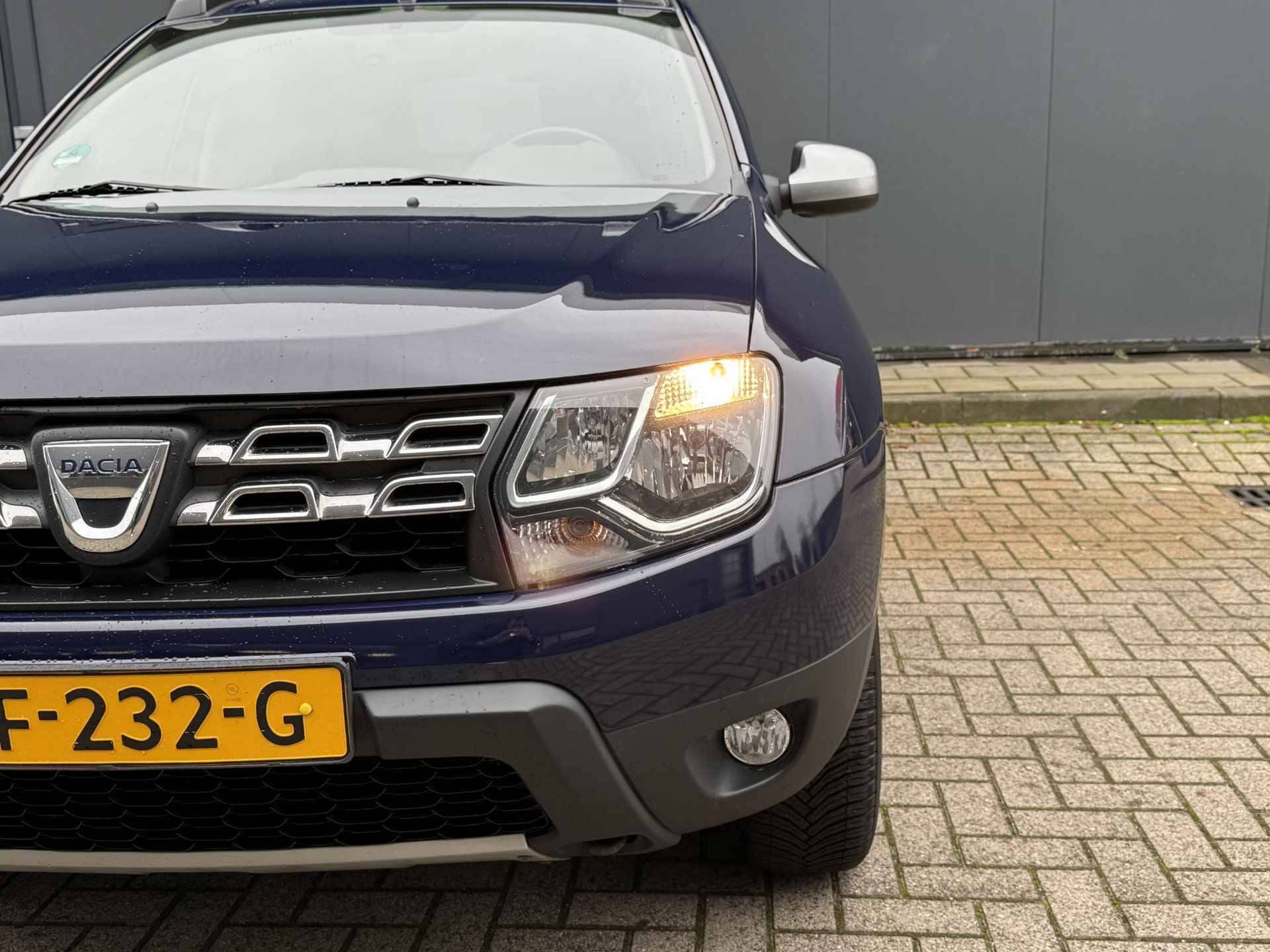 Dacia Duster 1.2 TCe 4x2 Lauréate / Trekhaak / Cruise Control / Airco / All-Season banden /  Bluetooth / set Winterbanden - 33/35