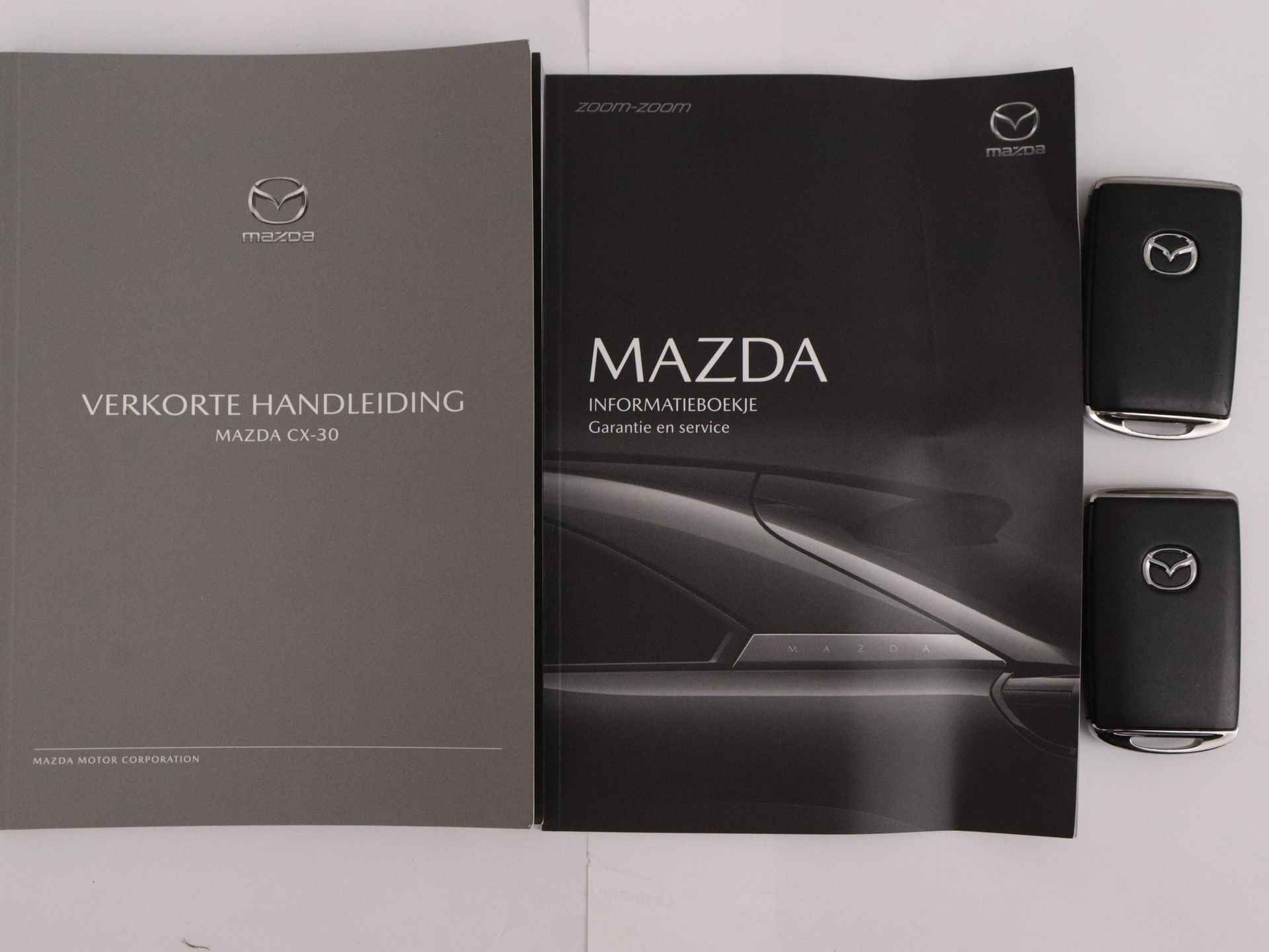 Mazda CX-30 2.0 e-SkyActiv-X M Hybrid Homura automaat | Camera | Stoelverwarming | - 14/46