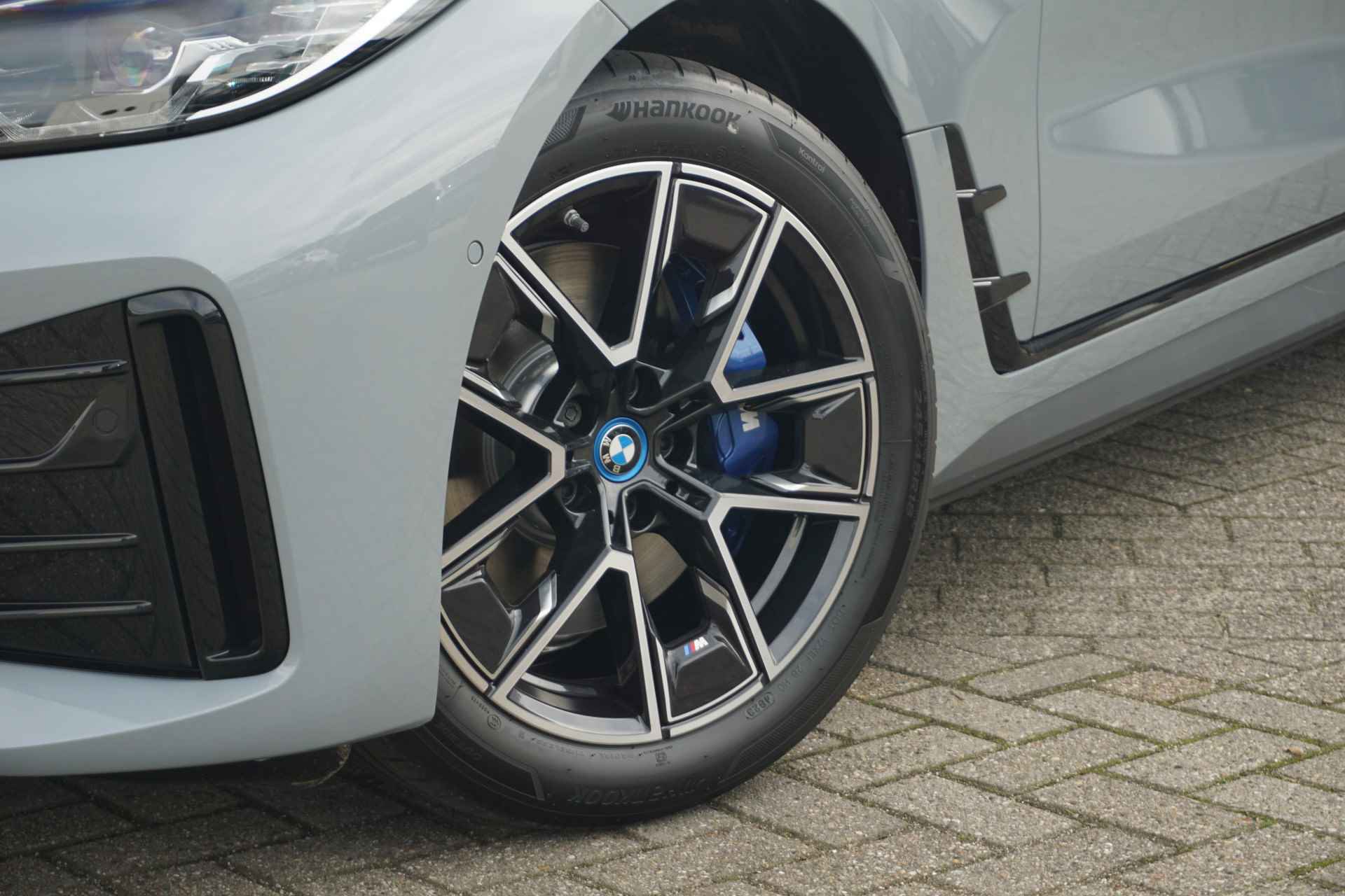 BMW i4 eDrive35 High Executive 70 kWh | M Sportpakket - 7/28