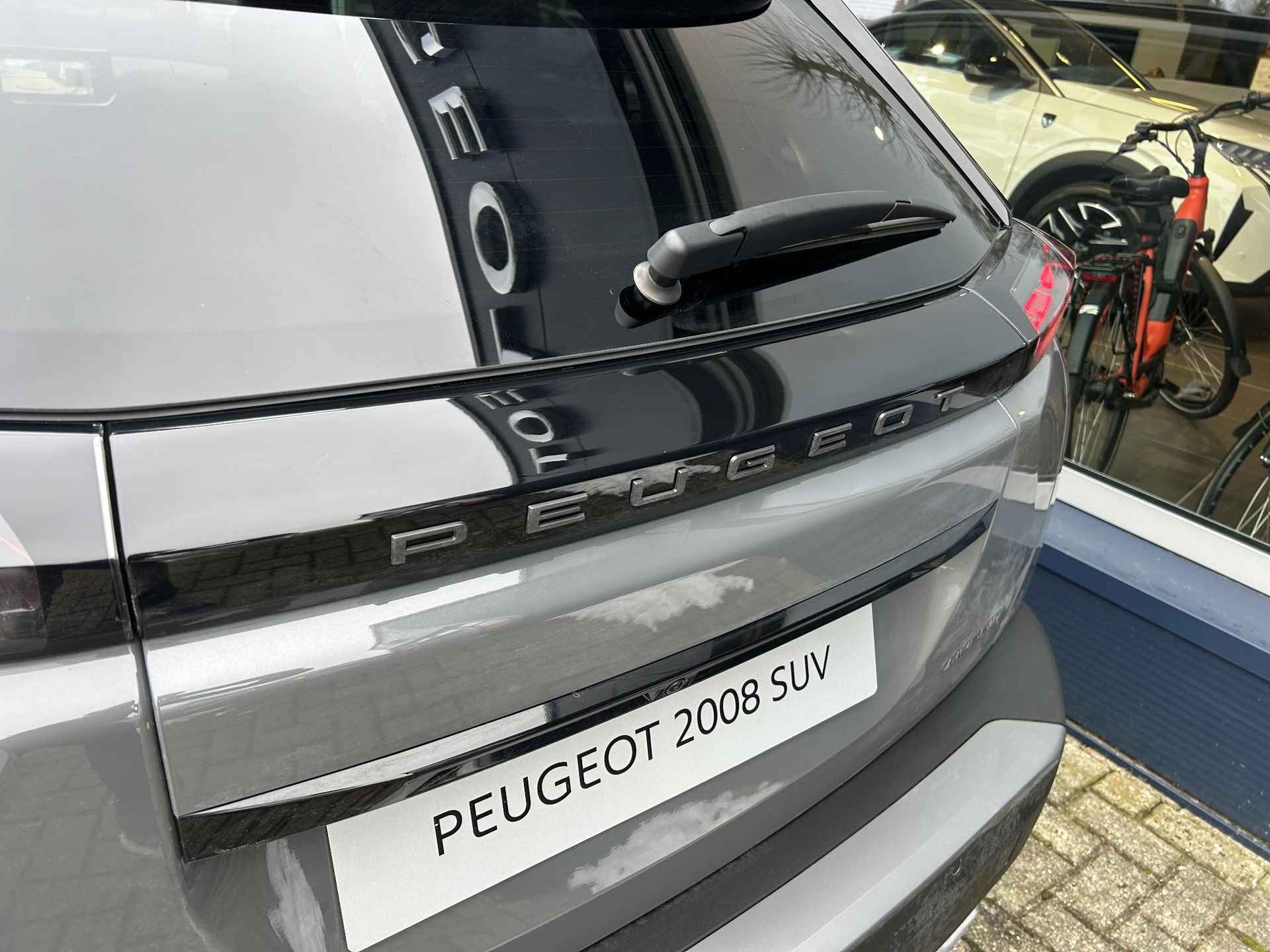 Peugeot 2008 1.2 Hybrid 136 GT | Nieuwe Hybride Uitvoering | Schuif-Kantel Panoramadak | Navigatie | Keyless Entry | HD 360 Graden Camera | Dode Hoek Detectie | 18 Inch Velgen | Full LED Verlichting | Cruise Control adaptief | Climate Control | - 31/50