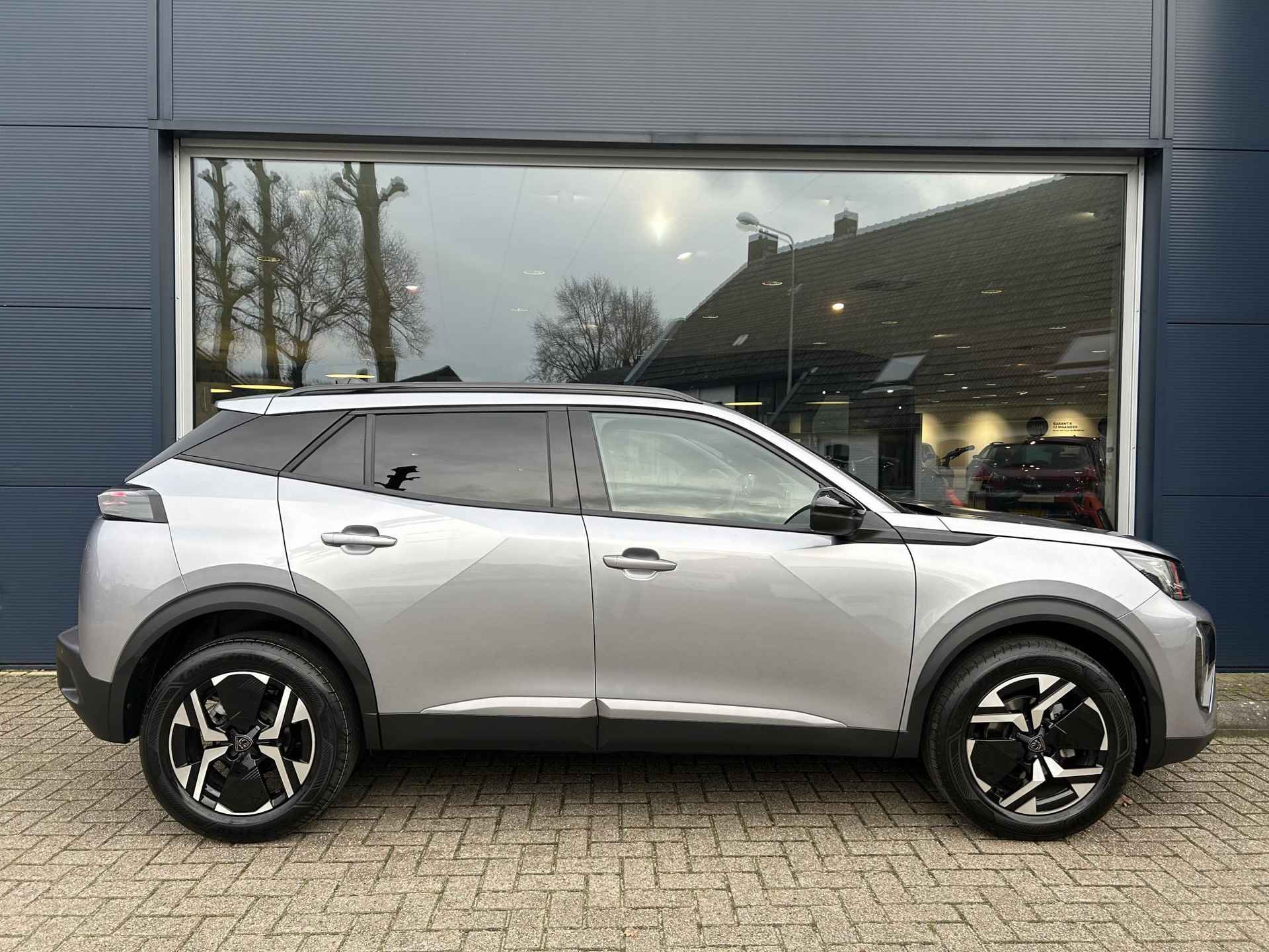 Peugeot 2008 1.2 Turbo 100 PK Allure | € 9.000,- Demo korting! | Navigatie | 360 Graden Camera | Dode Hoek Detectie | Climate Control | LED Verlichting | Cruise Control | 17" Lichtmetalen Velgen | Hoge Zitpositie | Half Lederen Bekleding | - 19/49