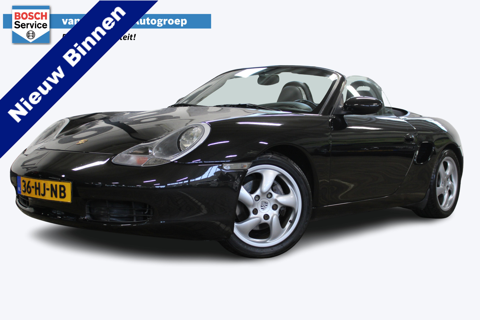 Porsche Boxster 2.7 | Hard en soft top dak | Elektrisch bedienbaar cabrio dak | Airco | Cruise | 16 Inch LMV | Half leder/alcantara bekleding | Origineel NL auto | NAP |