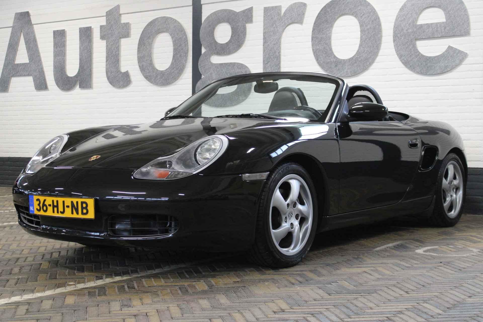 Porsche Boxster 2.7 | Hard en soft top dak | Elektrisch bedienbaar cabrio dak | Airco | Cruise | 16 Inch LMV | Half leder/alcantara bekleding | Origineel NL auto | NAP | - 20/51