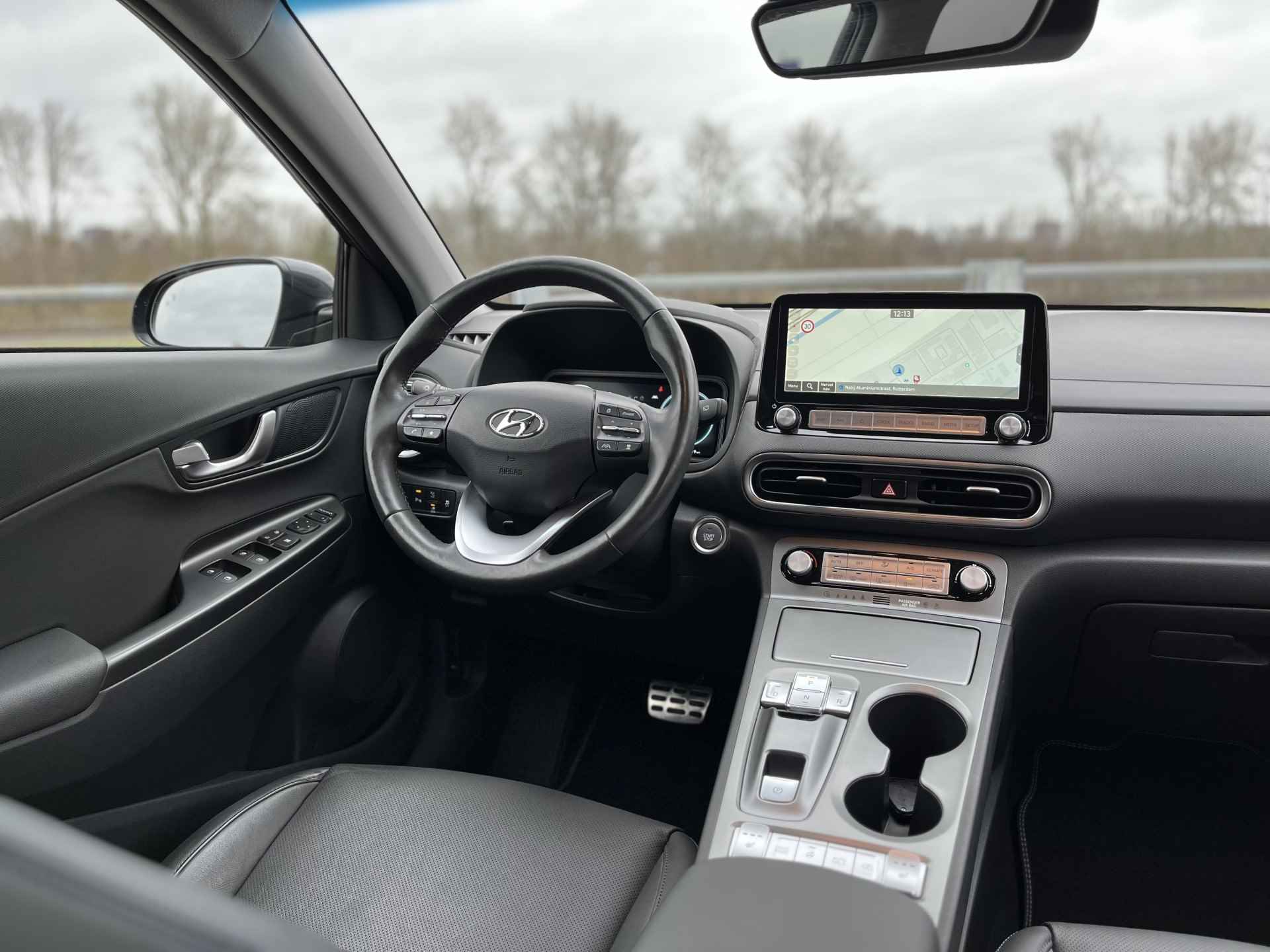 Hyundai KONA EV Premium 64 kWh | Leder | Stoelverwarming | Navigatie - 16/39