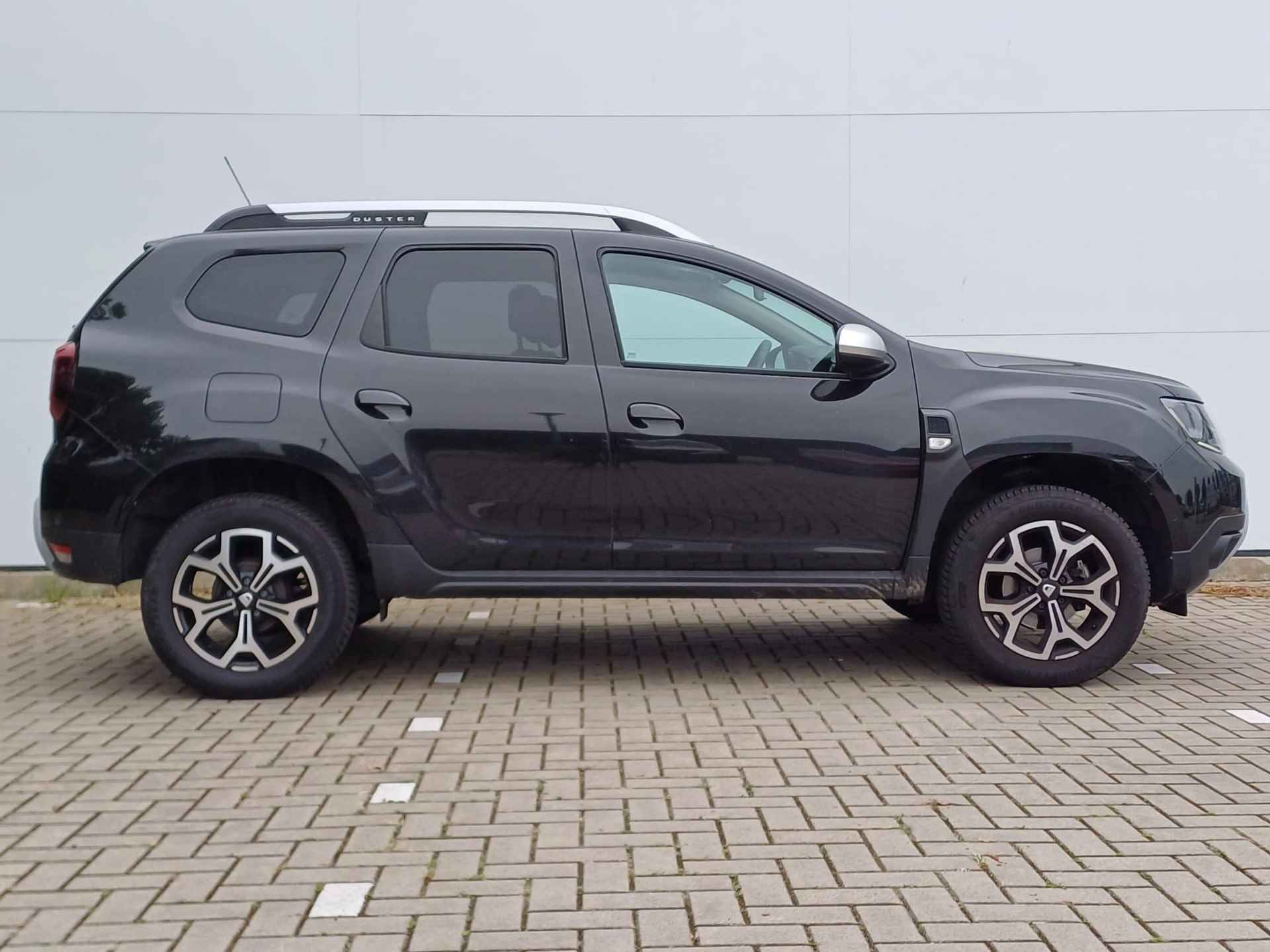 Dacia Duster 1.0 TCe 100 Bi-Fuel Prestige LPG-G3 / Navigatie / Climate Control / Parkeersensoren + Camera / Lichtmetalen Velgen / Cruise Control / LED - 31/32