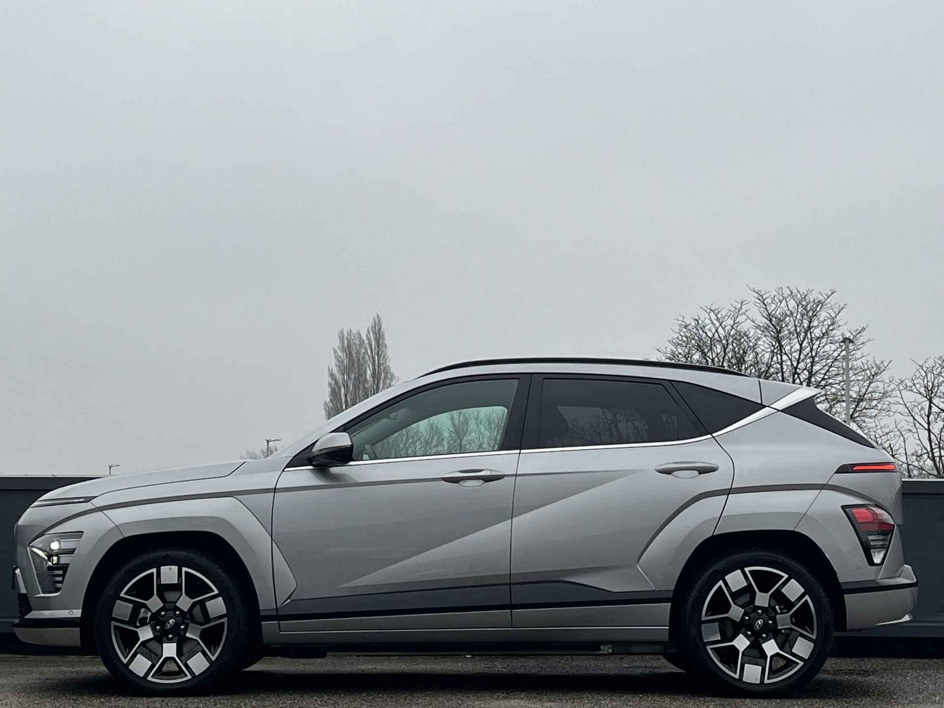 Hyundai Kona Electric Premium 65.4 kWh |WARMTEPOMP|VOORVERWARMING|STOELVERKOELING|360 CAMERA| - 9/61