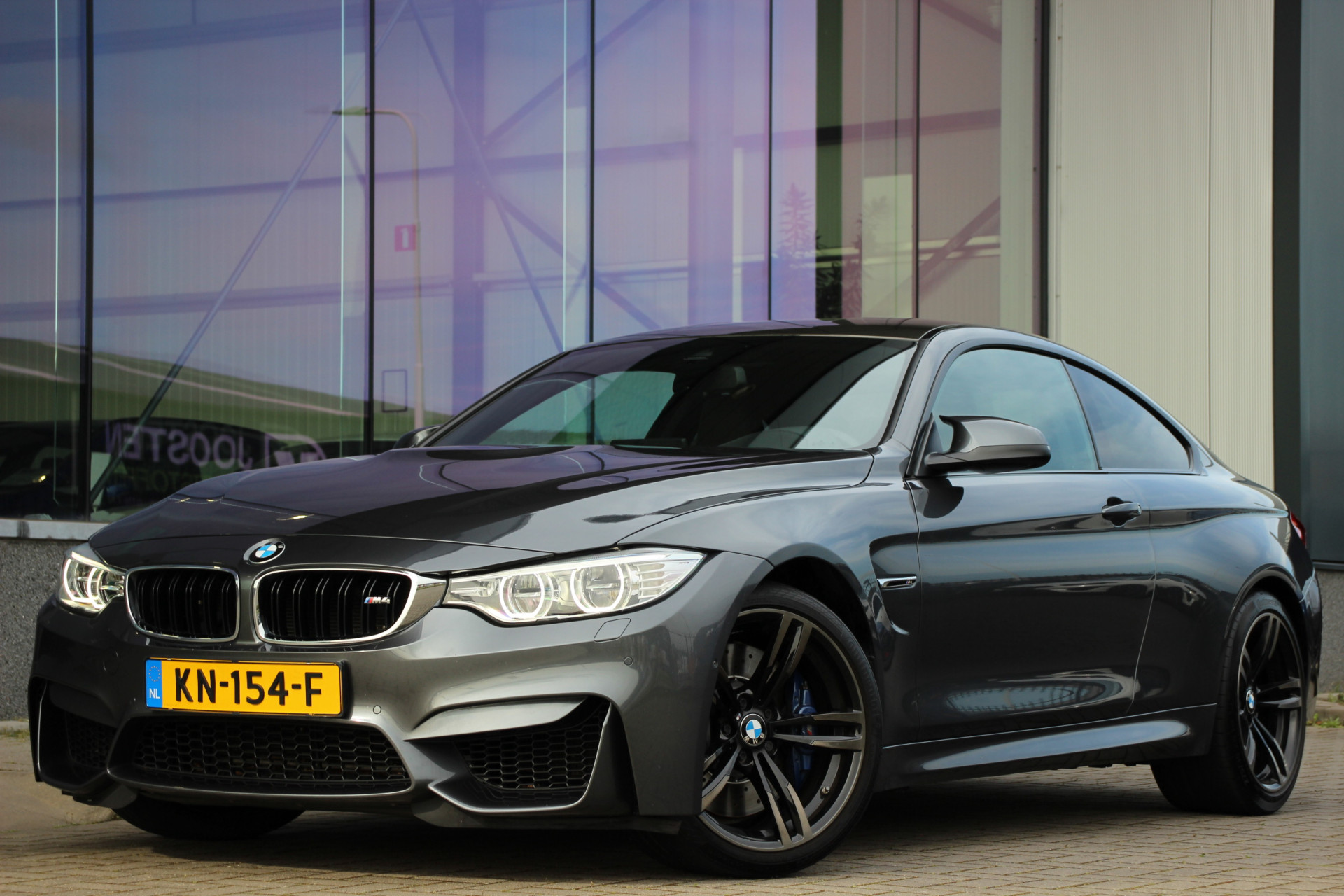 BMW 4 Serie Coupé M4 | HUD | Carbon | H/K | 360° Camera | Dealer onderhouden |
