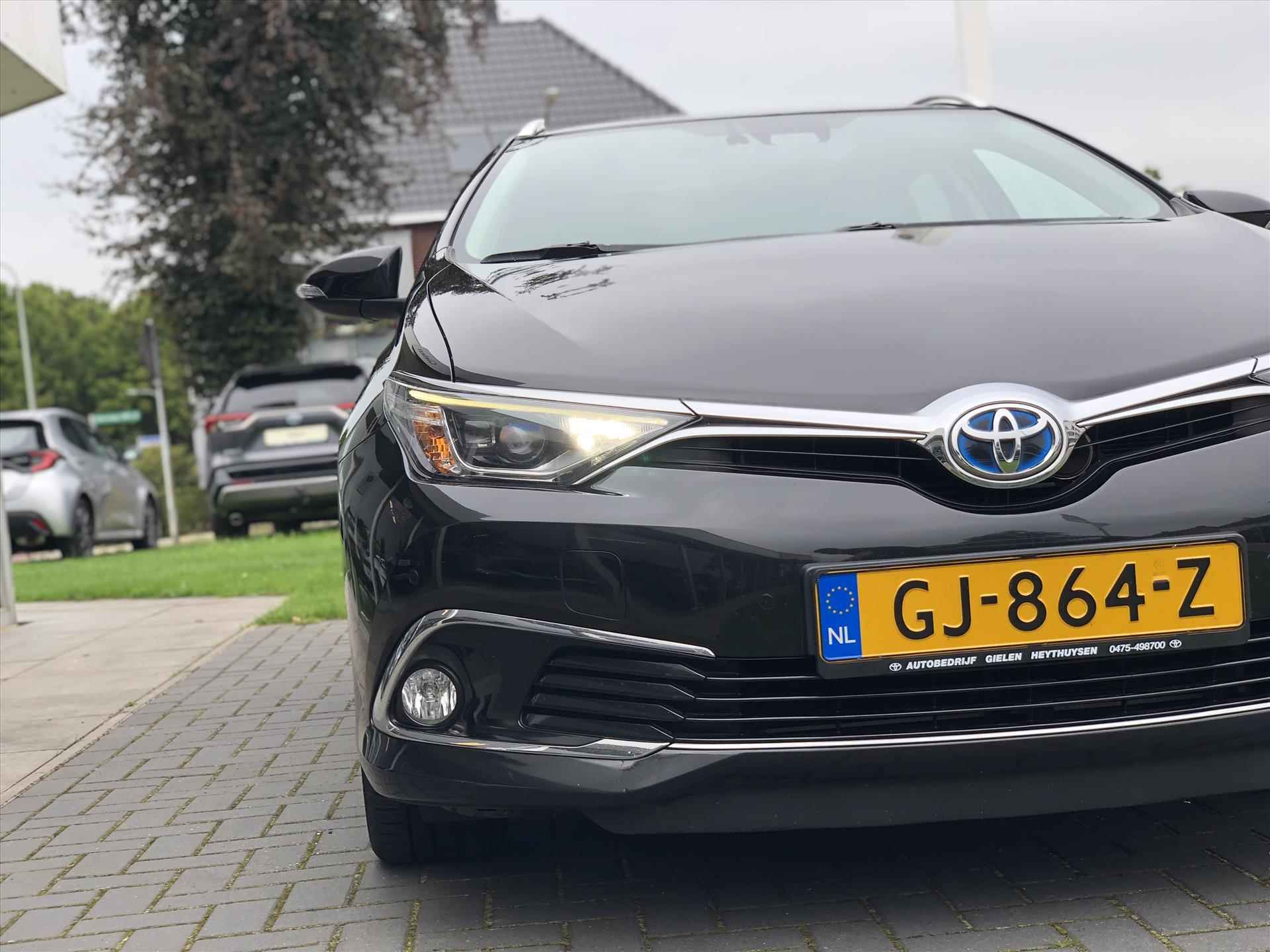 Toyota Auris 1.8 Hybrid Touring Sports Lease Pro | Panoramadak, Navigatie, Parkeersensoren, Half leer, Stoelverwarming, Facelift - 7/40