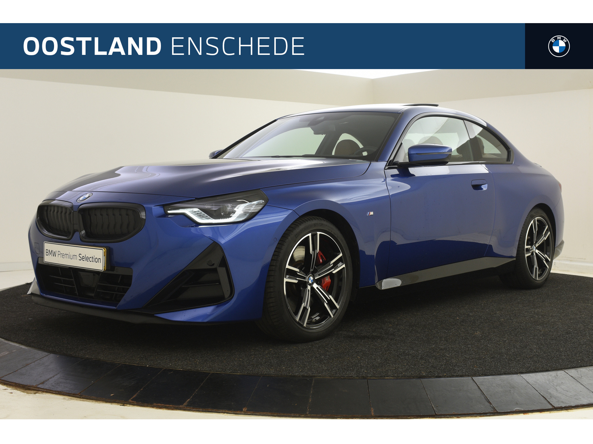 BMW 2 Serie Coupé 220i High Executive M Sport Automaat / Schuif-kanteldak / Stoelverwarming / Adaptieve LED / Parking Assistant / Live Cockpit Professional / M Sportonderstel