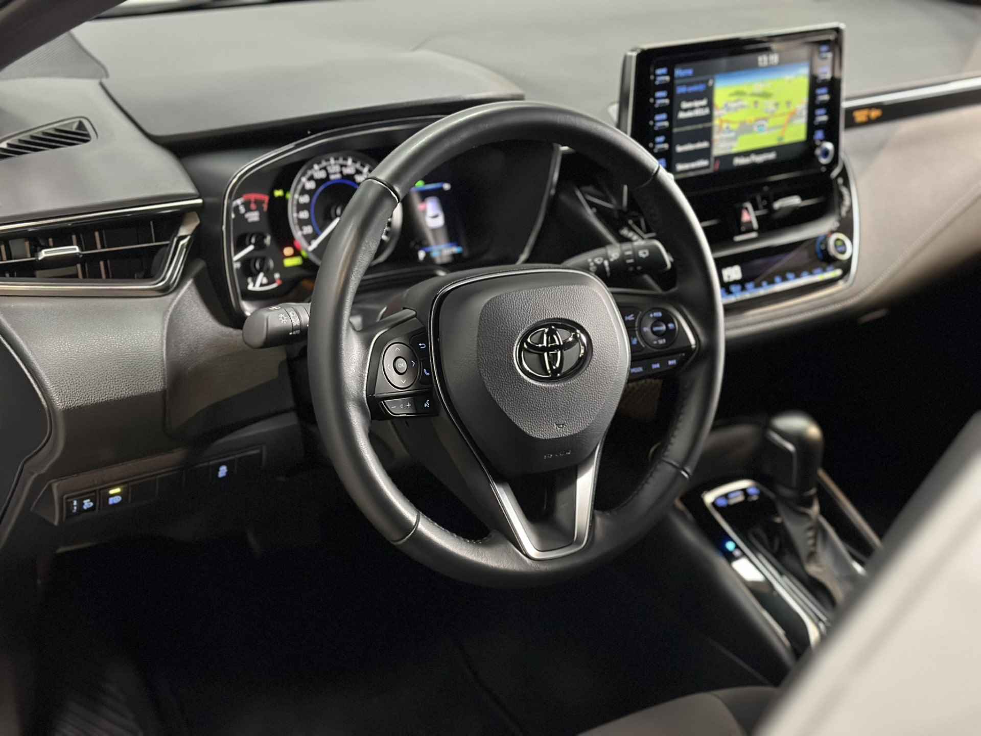 Toyota Corolla Touring Sports 1.8 Hybrid Active LED | Camera | Adaptive cruise | Navigatie | Apple Carplay Android Auto | Isofix | NAP | - 15/37