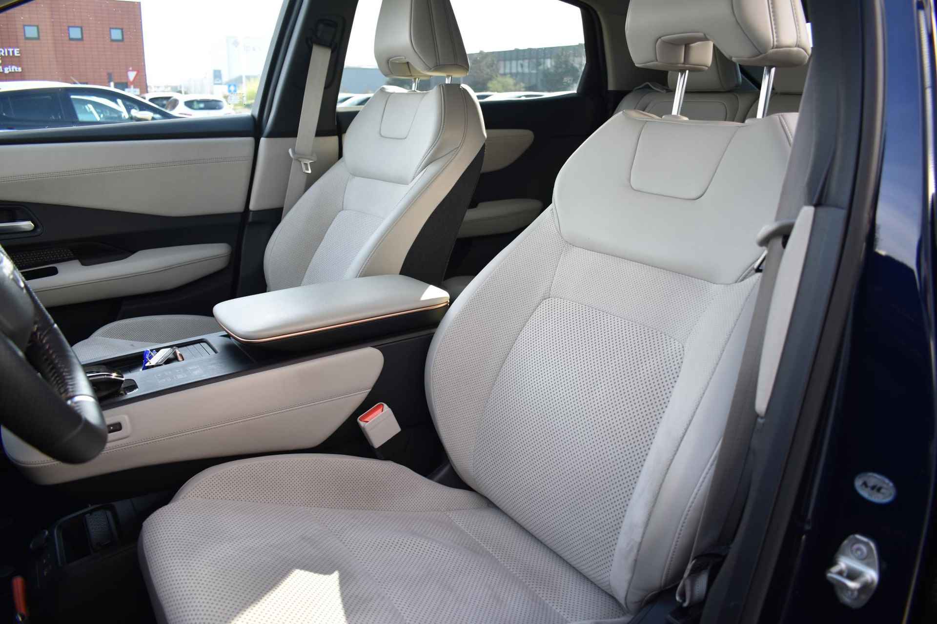 Nissan Ariya Evolve 91 kWh 240pk | Bose Audio | Draadloze Apple Carplay & Android Auto | Afneembare Trekhaak | Elektrisch Verstelbare Stoelen | Stoel/Stuurwiel Verwarming | - 19/46