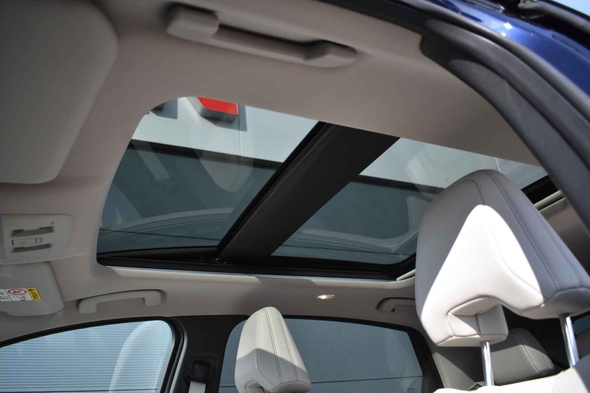 Nissan Ariya Evolve 91 kWh 240pk | Bose Audio | Draadloze Apple Carplay & Android Auto | Afneembare Trekhaak | Elektrisch Verstelbare Stoelen | Stoel/Stuurwiel Verwarming | - 21/46