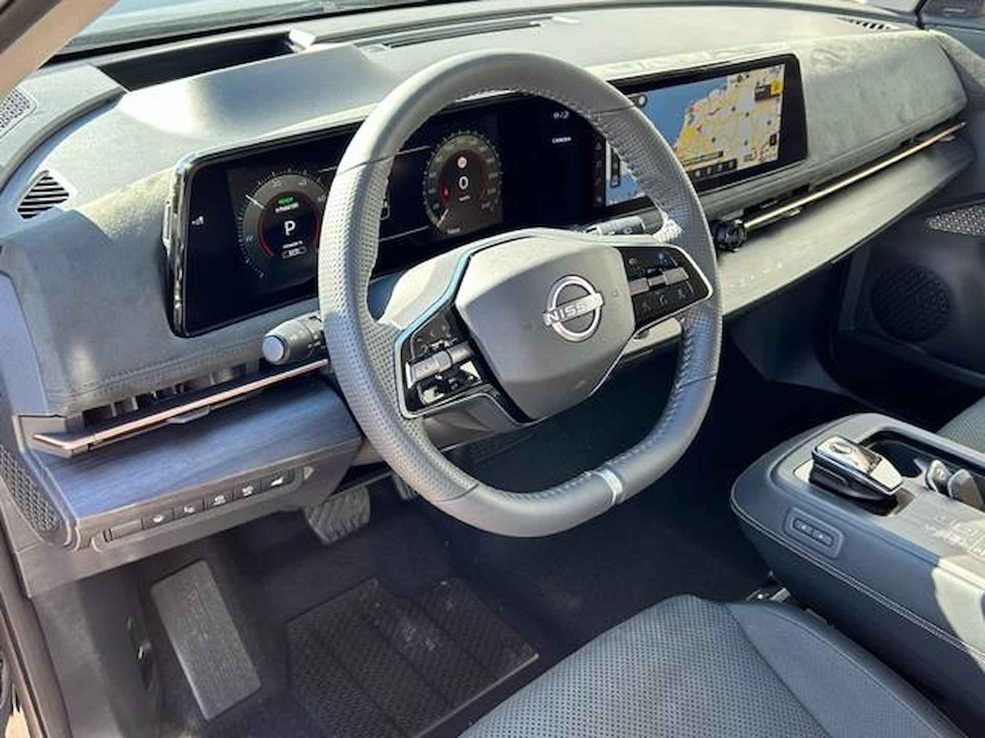 Nissan Ariya Evolve 91 kWh / Elektrisch schuif- kanteldak / Apple Carplay/Android Auto / Stoelverwarming voor en achter / Stuurverwarming / Stoelverkoeling voor / Adaptieve cruise control - 17/57