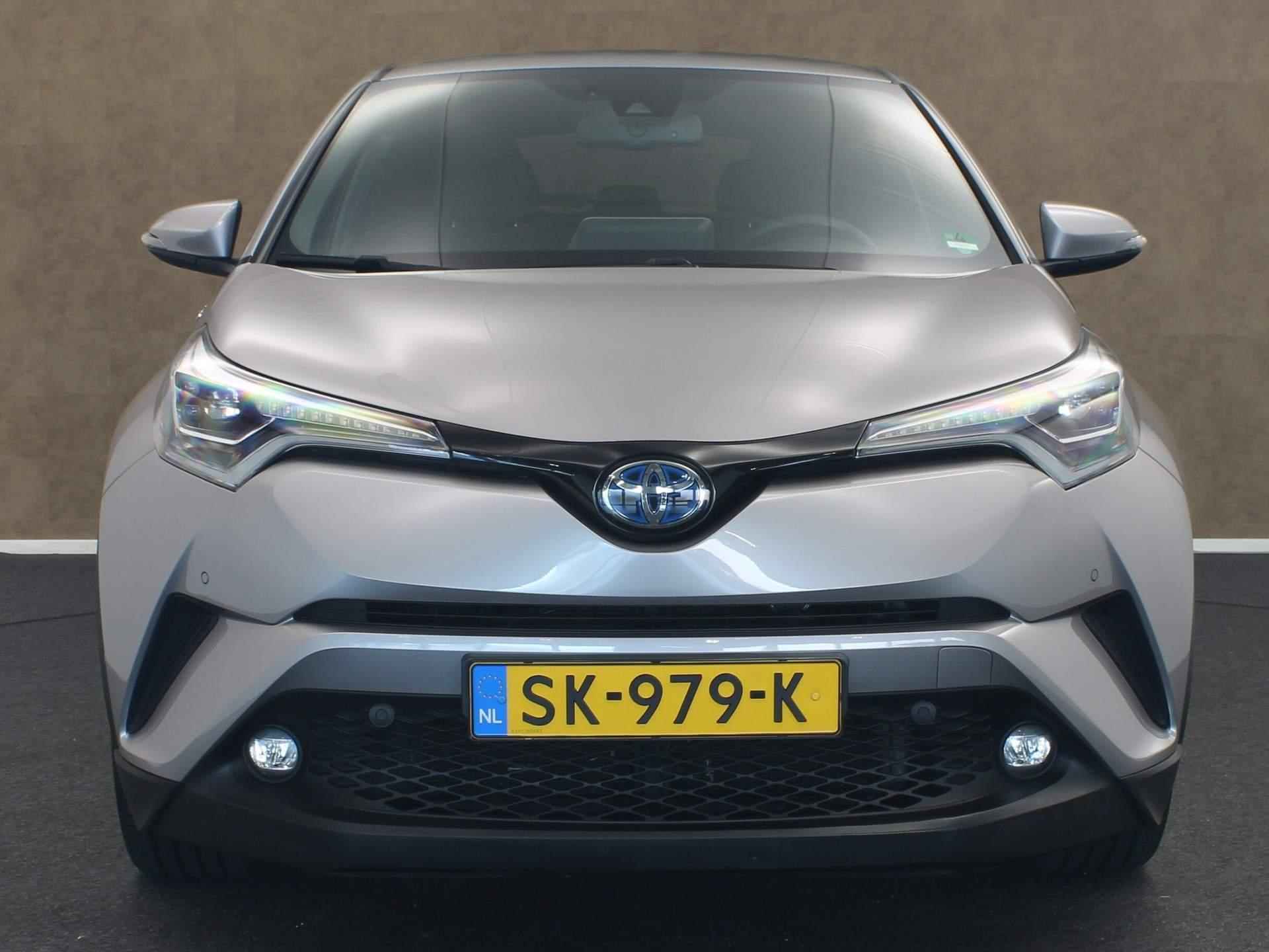 Toyota C-HR 1.8 Hybrid Dynamic  - NAVIGATIE - DODEHOEK DETECTIE - 18 INCH LICHT METALEN VELGEN - PARKEERASSISTENT - PARKEERSENSOREN VOOR/ ACHTER - VOORSTOELEN VERWARMD - CLIMATE CONTROL - 6/44