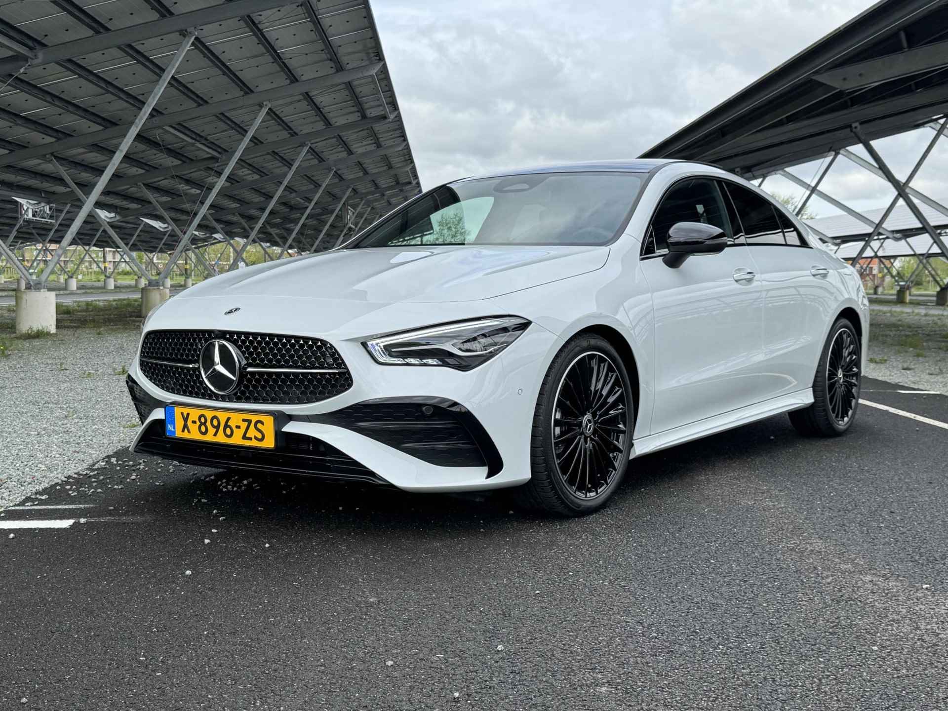 Mercedes-Benz CLA-klasse Coupe 180 AMG Line | Panorama-schuifdak | Parkeercamera | Stoelverwarming | Sfeerverlichting | - 10/32