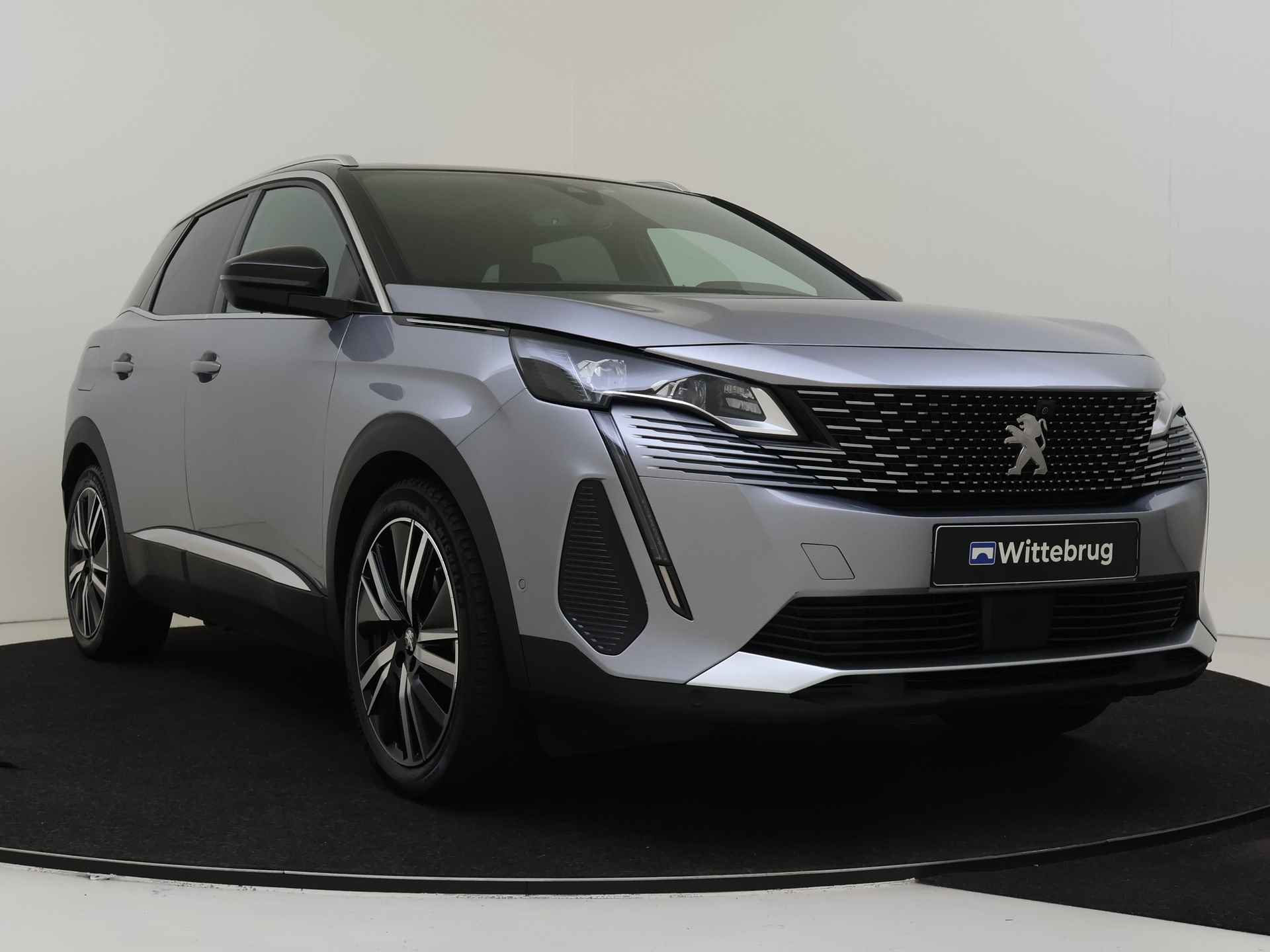 Peugeot 3008 1.6 HYbrid4 GT Pack Business 300 pk Automaat | Navigatie | Panorama dak | FOCAL Audio systeem - 4/39