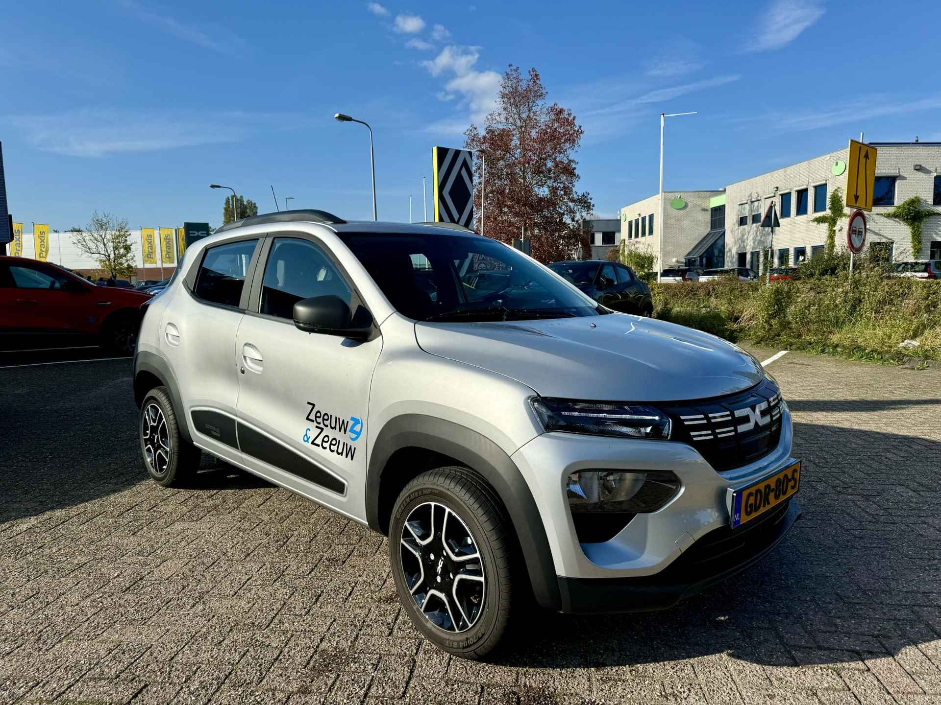 Dacia Spring Expression 27 kWh | DC Lader | Camera | Airco | Carplay | Demonstratie voertuig | Prijs is inclusief SEPP €2.000,- | - 7/17