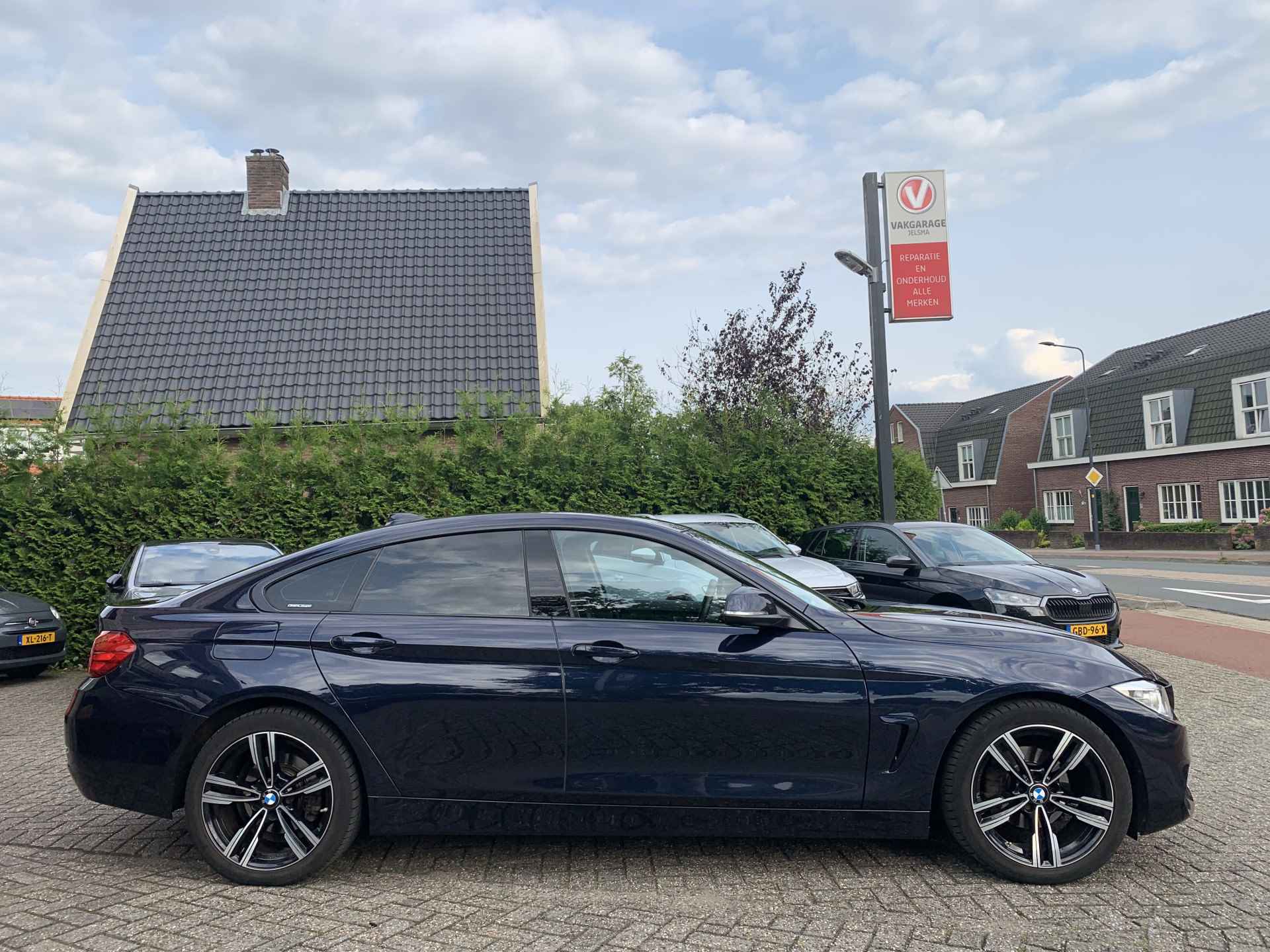 BMW 4 Serie Gran Coupé 418i High Executive Aut. M-Sport | Navi | Leer - 8/33