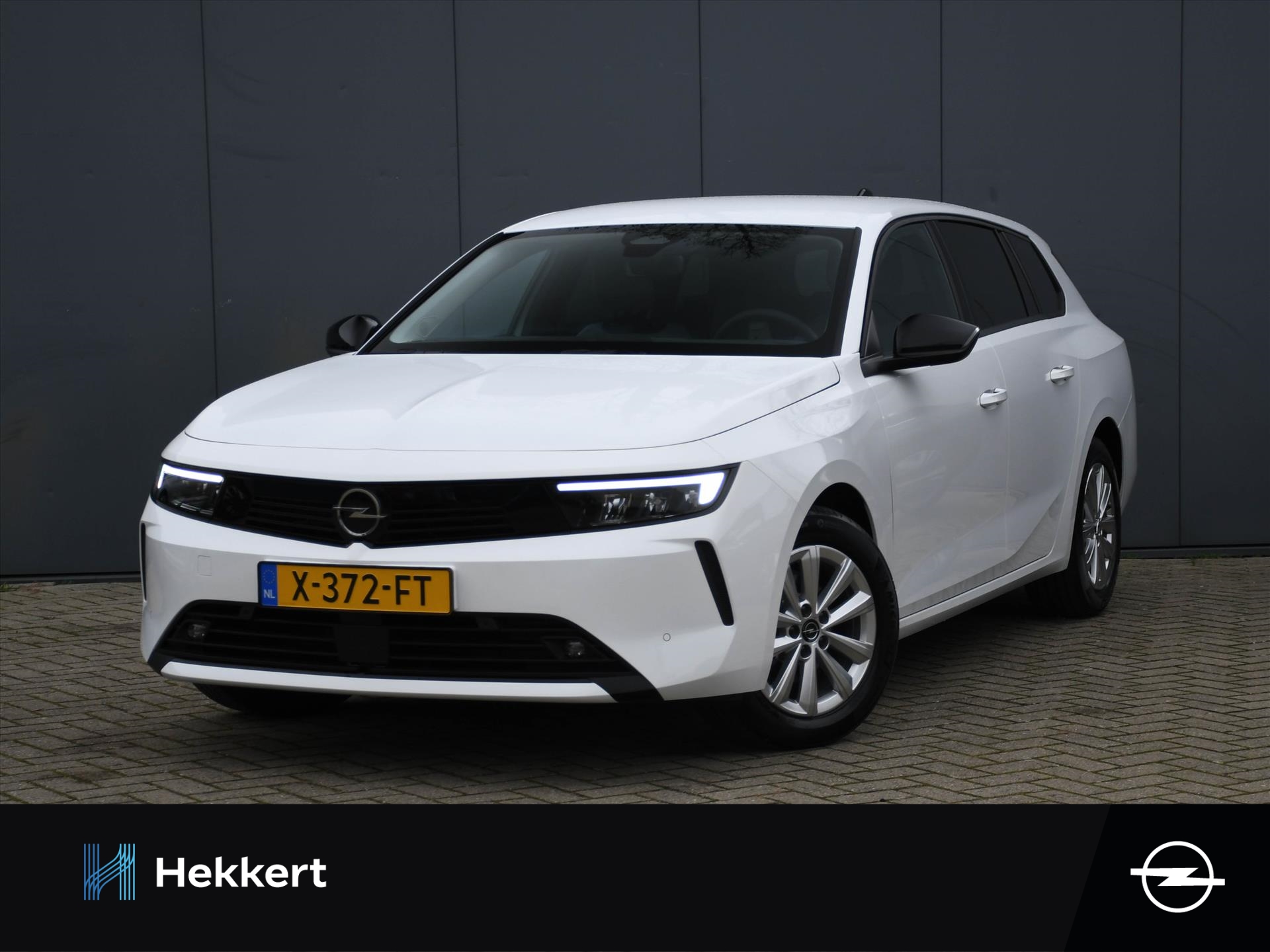 Opel Astra Sports Tourer Edition 1.2 Turbo 110pk NAVI | CRUISE | CLIMA | APPLE CARPLAY | DAB | USB | PDC VOOR+ACHTER | 16''LM bij viaBOVAG.nl