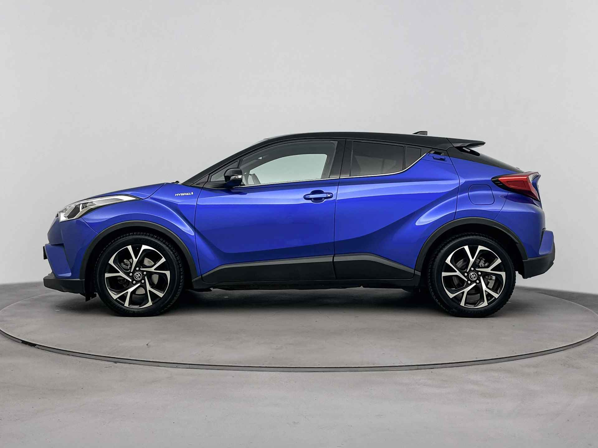 Toyota C-HR 1.8 Hybrid Dynamic Bi-Tone Limited | Navigatie | LM velgen | Cruise Control Adaptief | - 4/40