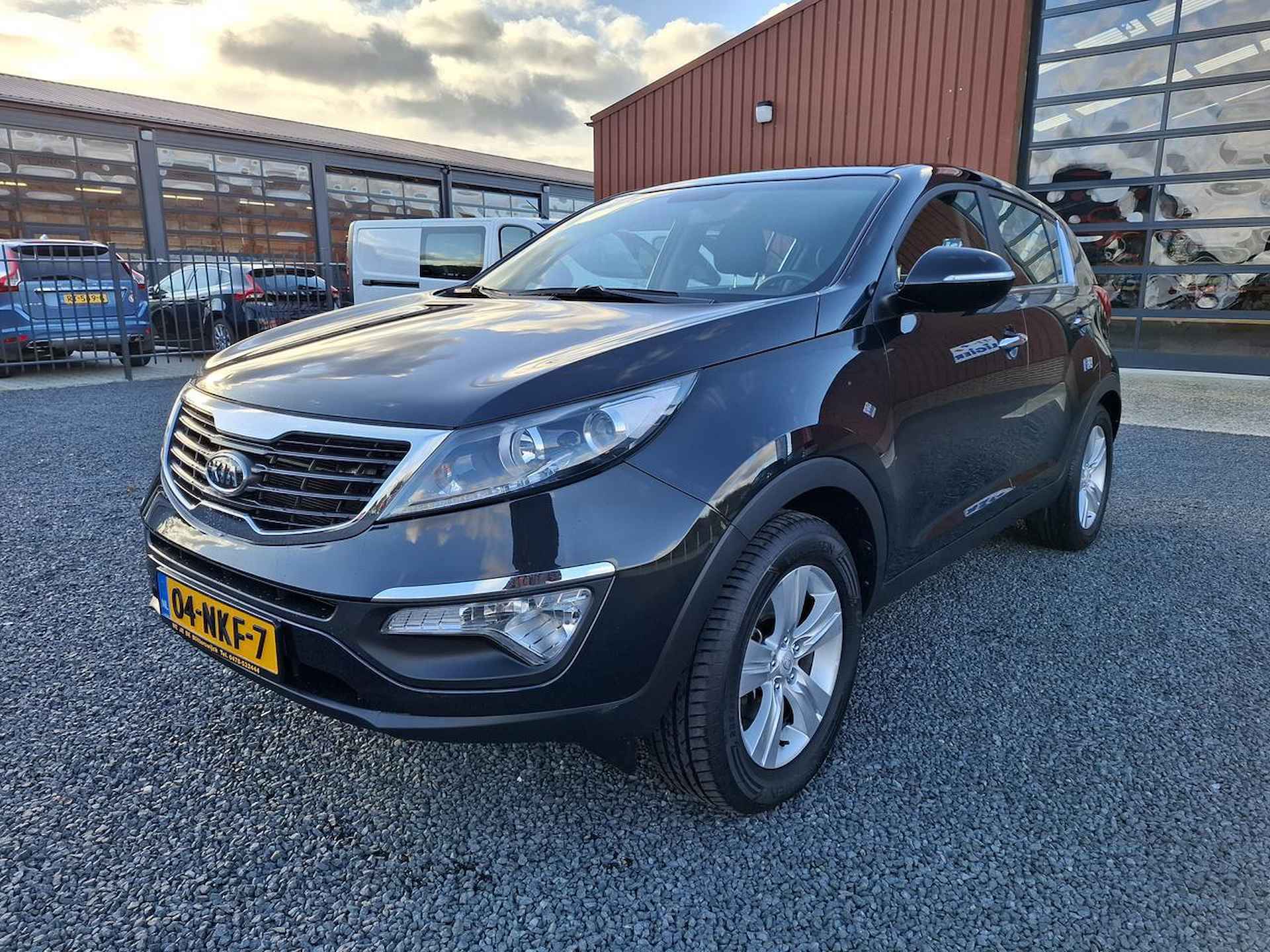 Kia Sportage 2.0 CVVT X-ECUTIVE - 2/25