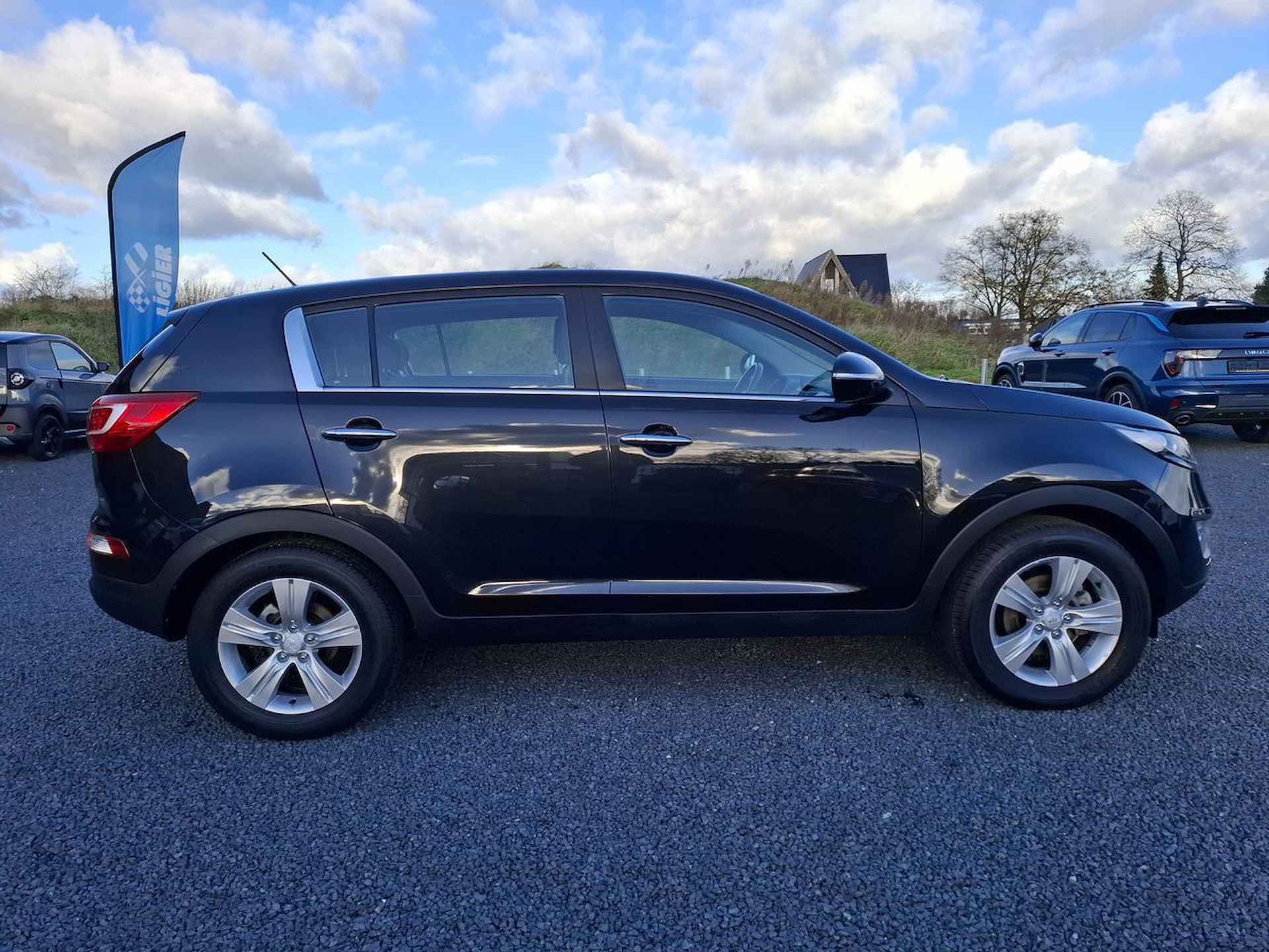 Kia Sportage 2.0 CVVT X-ECUTIVE - 7/25