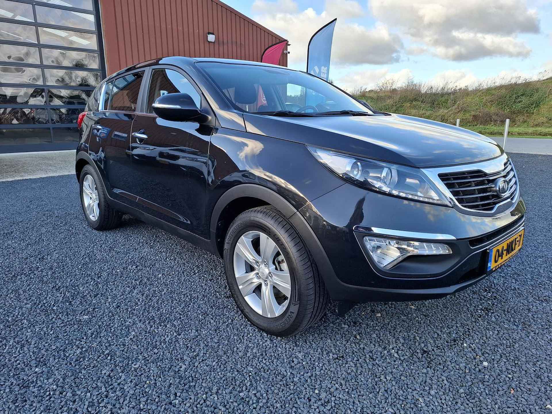 Kia Sportage 2.0 CVVT X-ECUTIVE - 8/25