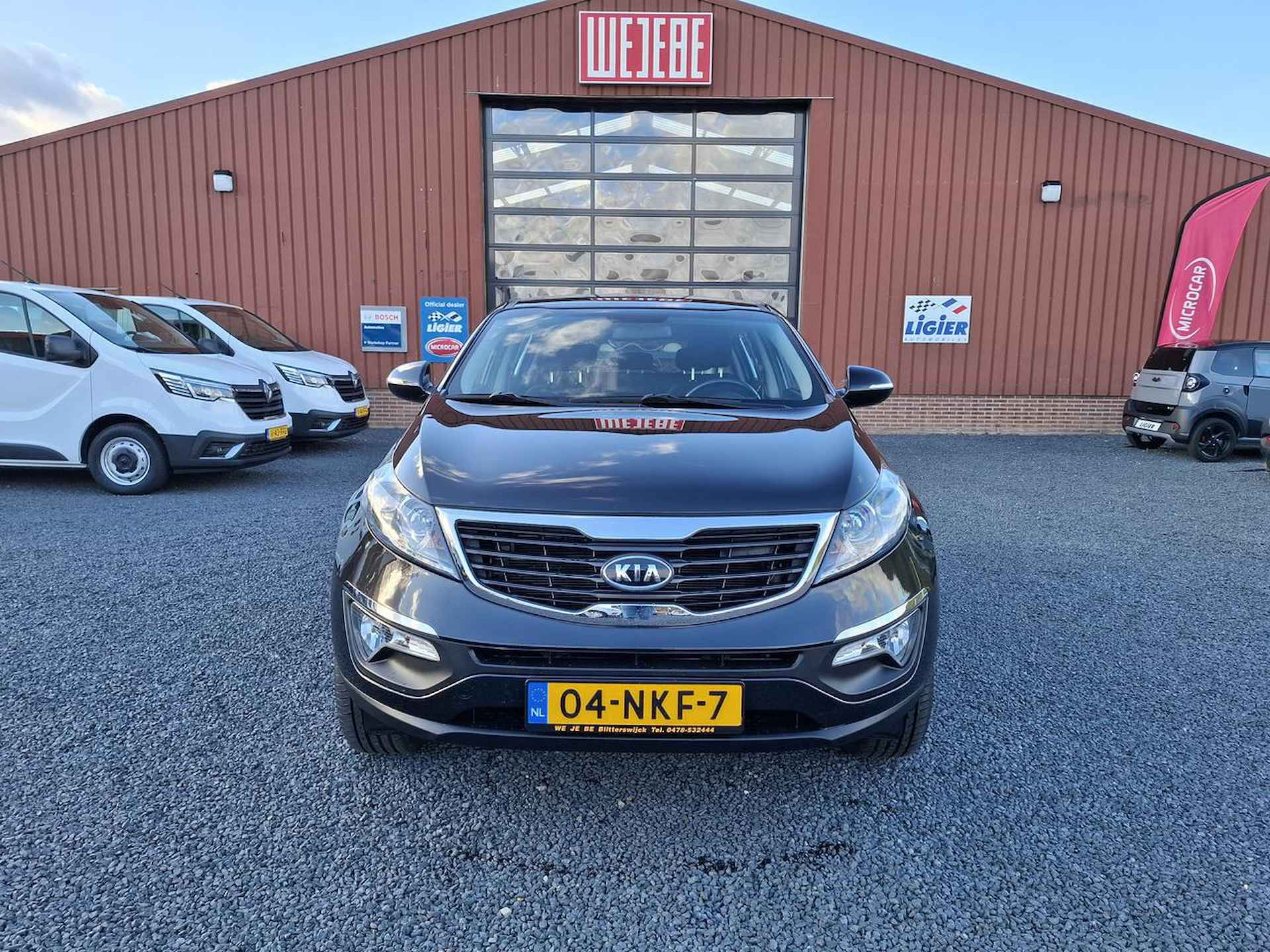 Kia Sportage 2.0 CVVT X-ECUTIVE - 9/25