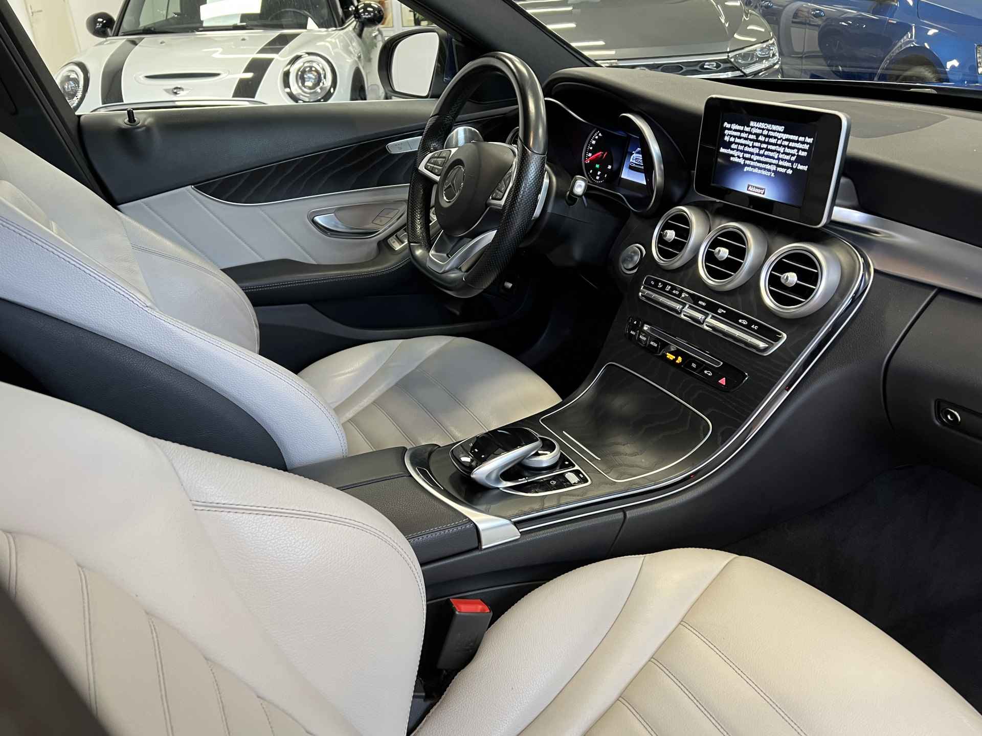 Mercedes-Benz C-Klasse Estate 180 AMG Sport Edition I Burmester audiosysteem I Panorama dak I Keyless entry I - 34/48