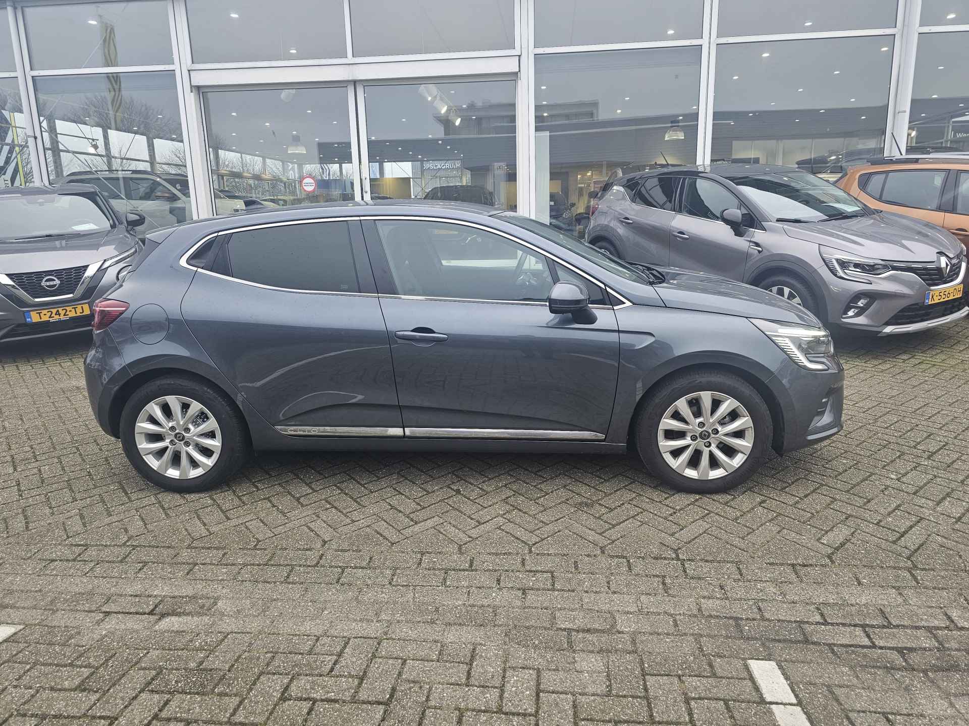 Renault Clio 1.0 TCe 100pk Intens | LED | Navigatie | Cruise | Apple Carplay/Android Auto | incl. Bovag rijklaarpakket met 12 maanden garantie | - 7/32