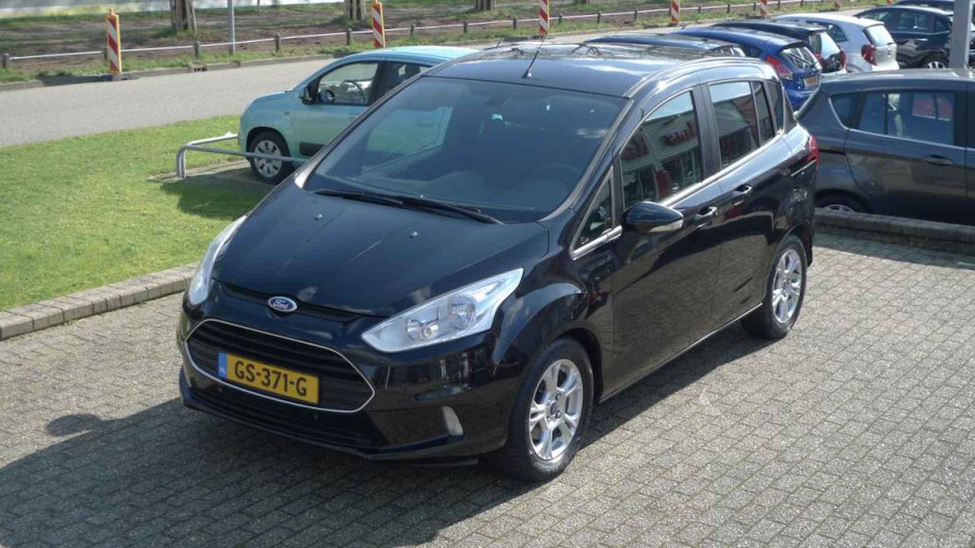 Ford B-Max 1.0 EcoBoost Titanium all-in prijs, parkeersensoren, stoelverwarming, allseason banden - 14/15