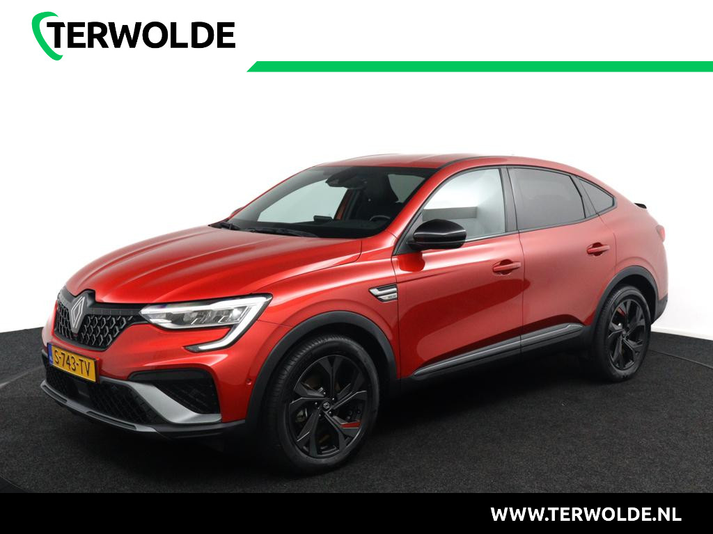 Renault Arkana 1.6 E-Tech Hybrid 145 R.S. Line | 1e Eigenaar | 100% Dealer Onderhouden | FACELIFT logo's | Stoelverwarming | Stuurwiel Verwarmd | Parelmoer Lak | LED Koplampen | Climate Control | Adaptieve Cruise Control |