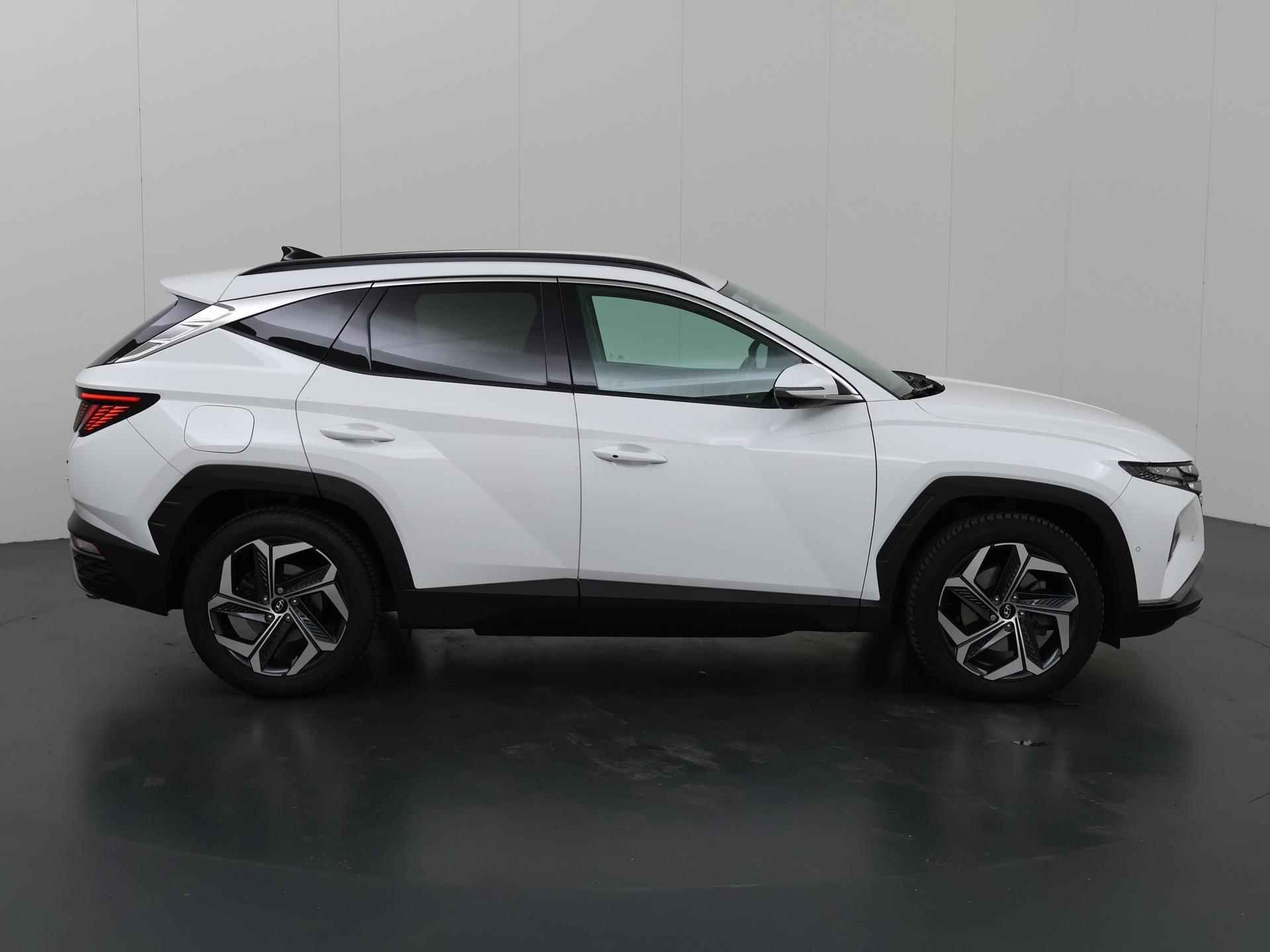 Hyundai Tucson 1.6 T-GDI PHEV Premium 4WD | Trekhaak | Stoelverwarming/Koeling | Ele.verstelbare stoelen + geheugen | 360 Camera | Navigatie | DAB | Apple CarPlay/Android Audio | Stuurverwarming | Adaptieve Cruise Control | Krell Audio | - 7/42