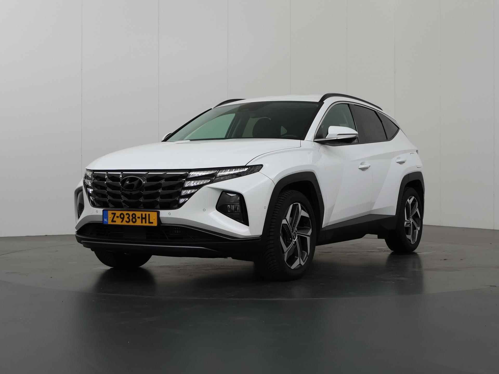 Hyundai Tucson 1.6 T-GDI PHEV Premium 4WD | Trekhaak | Stoelverwarming/Koeling | Ele.verstelbare stoelen + geheugen | 360 Camera | Navigatie | DAB | Apple CarPlay/Android Audio | Stuurverwarming | Adaptieve Cruise Control | Krell Audio | - 42/42