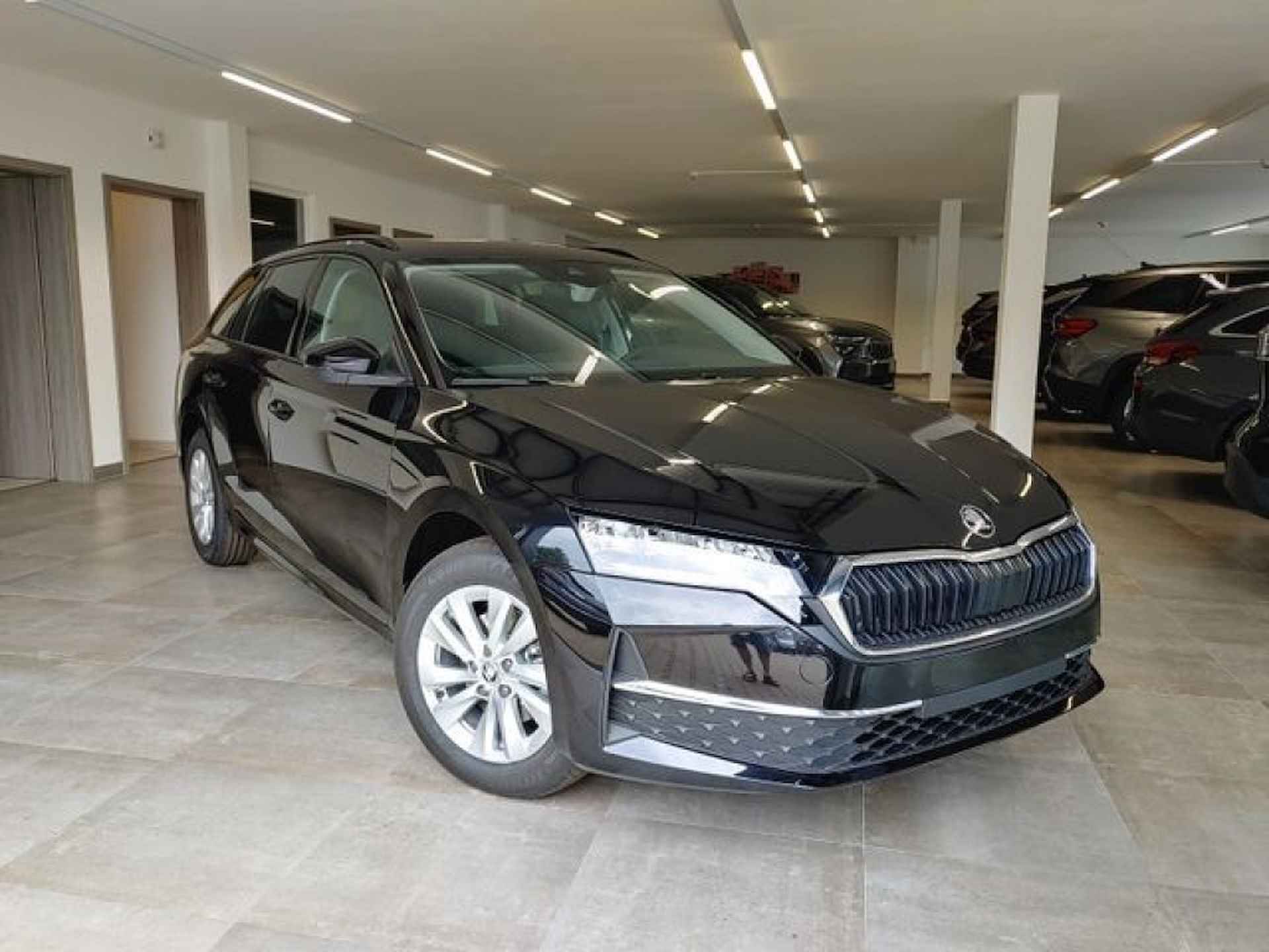 SKODA Octavia 1.5 TSI MHEV DSG SELECTION TREKHAAK/CARPLAY/PDC/STOELVERW - 2/14