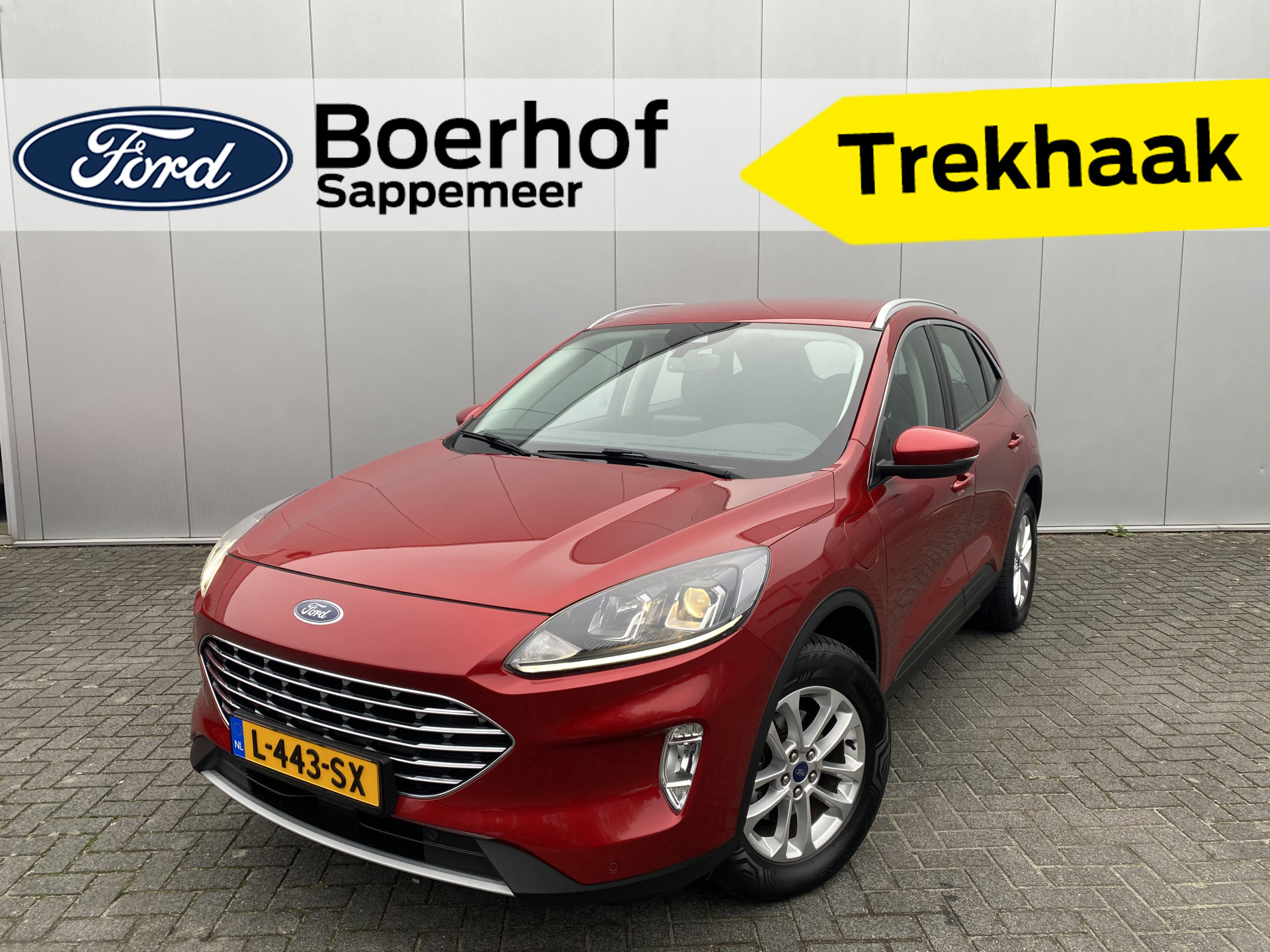 Ford Kuga 2.5 PHEV 225pk Titanium | Trekhaak | Winter Pack | Navi | Clima | Cruise | 1e eigenaar | 100% dealer onderh.