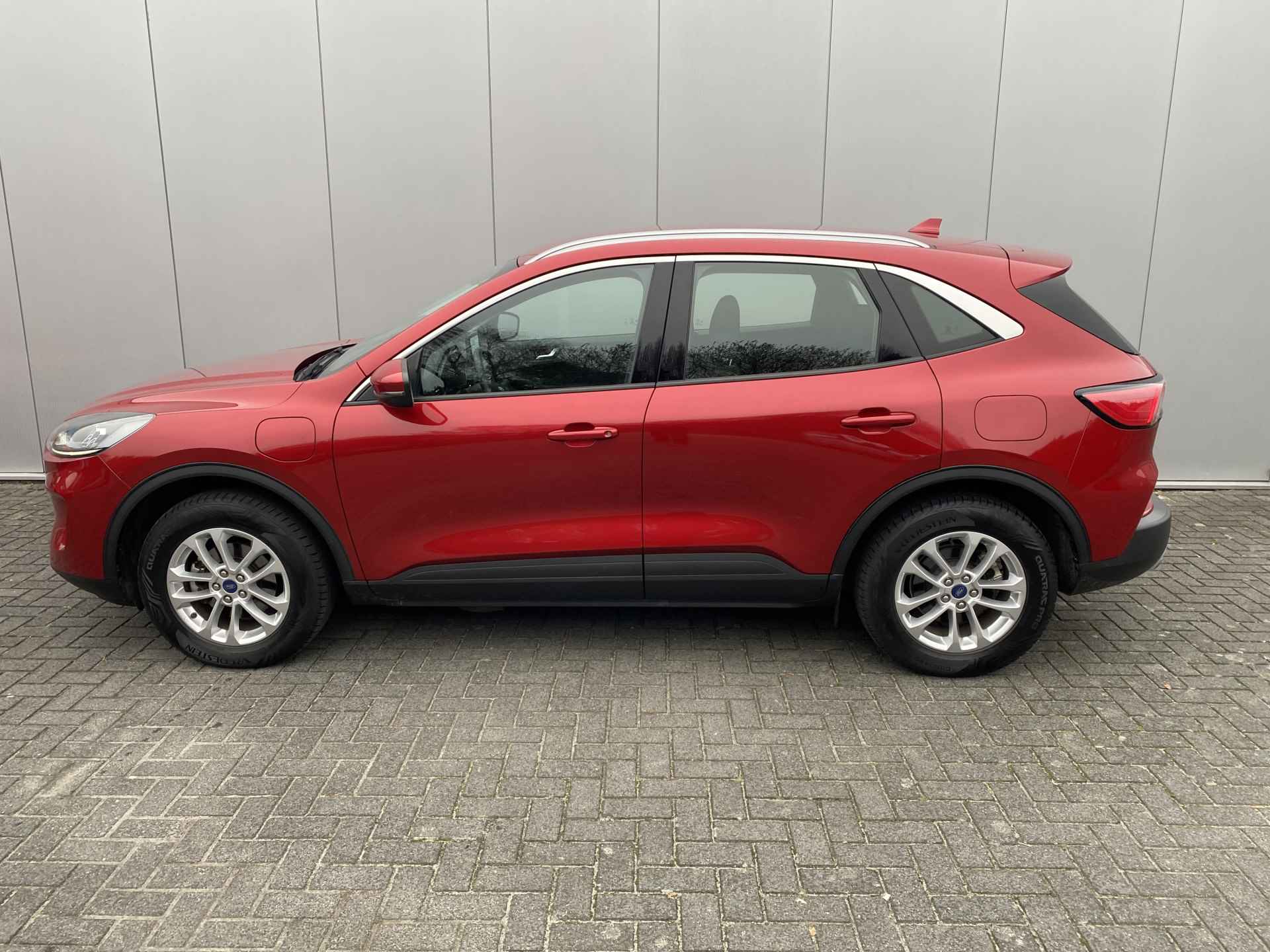 Ford Kuga 2.5 PHEV 225pk Titanium | Trekhaak | Winter Pack | Navi | Clima | Cruise | 1e eigenaar | 100% dealer onderh. - 2/29