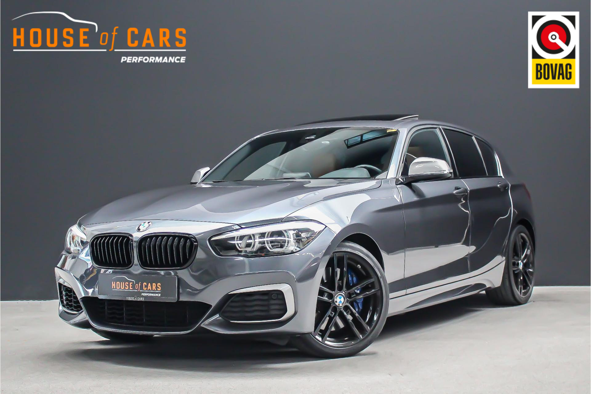 BMW 1-serie M140i 340pk High Executive H6 |handgeschakeld|schuifdak|cognac leder|Harman Kardon|adaptive led koplampen|