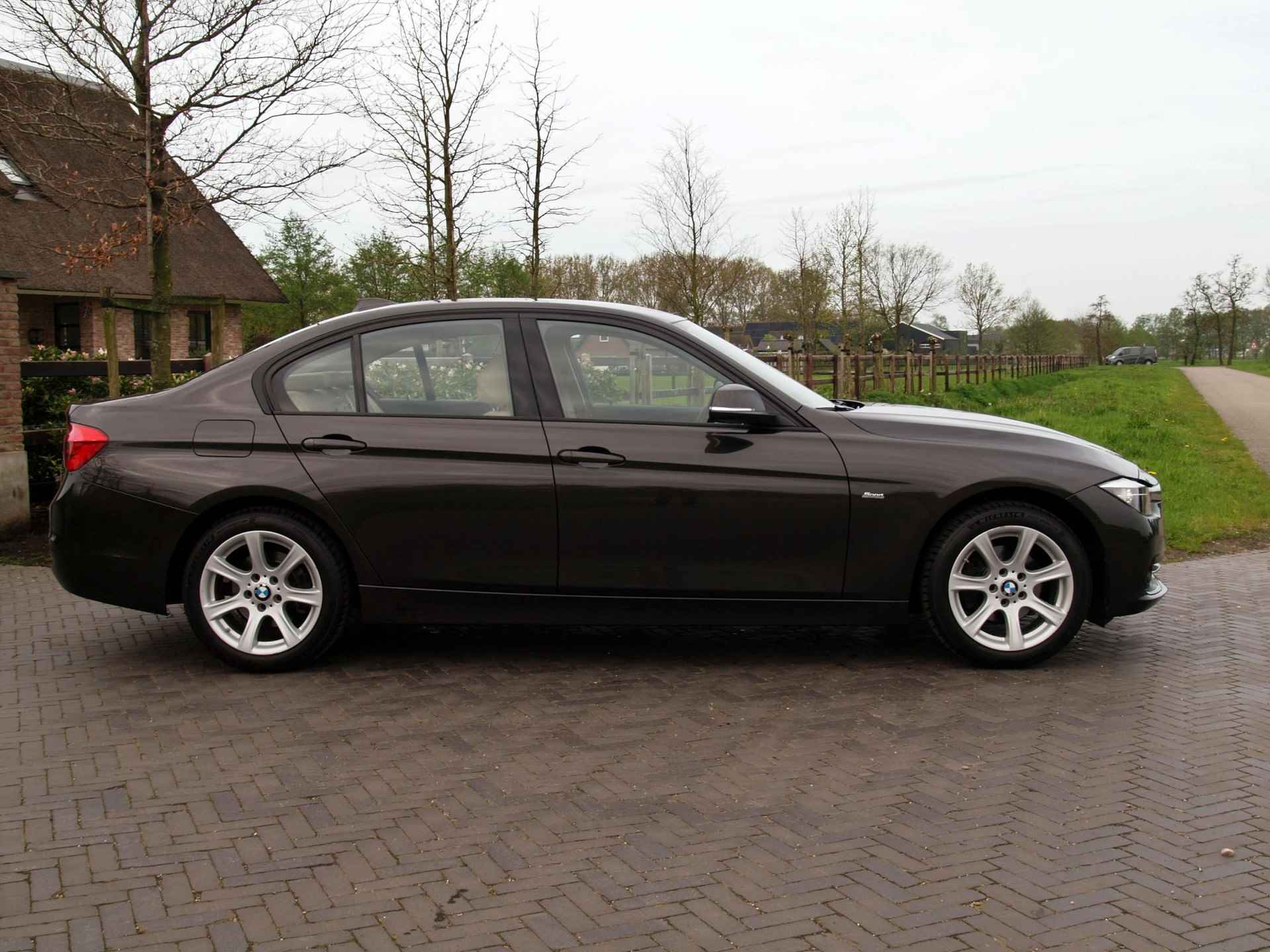 BMW 3-serie 318i Edition Luxury Line Purity Executive | Cruise Control | Navi | Bluetooth | - 9/28