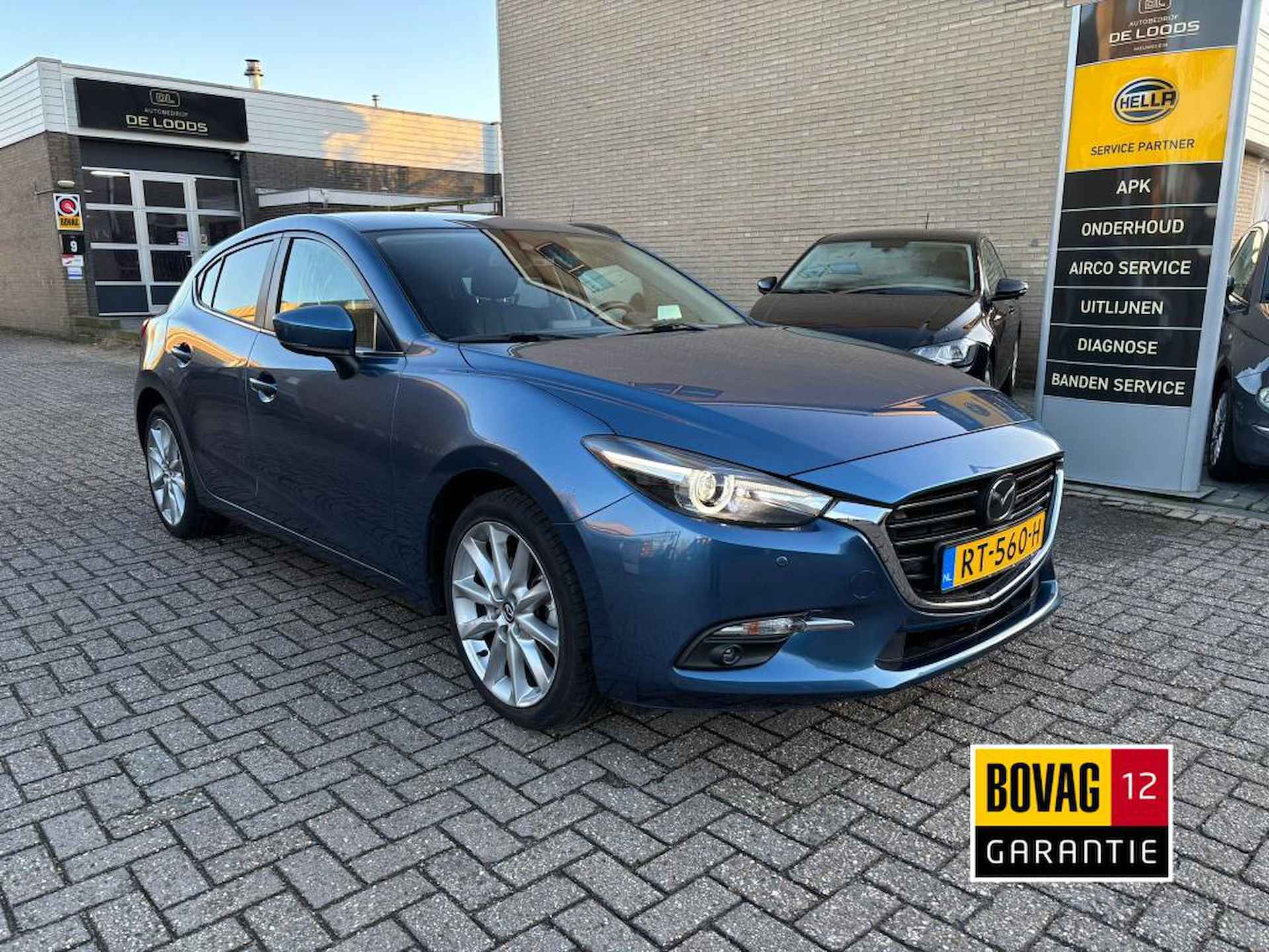 Mazda 3 2.0 S.A.120 GT-M STUUR/STOEL VERW,LEER, BOSE,HEADUP, TREKHAAK. 12MND BOVAG GARANTIE