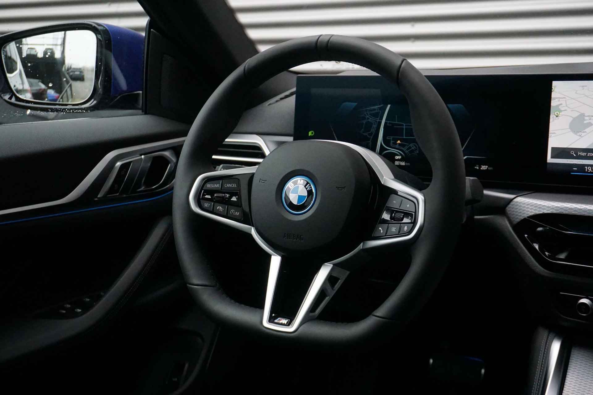 BMW i4 Gran Coupe eDrive35 M Sportpakket | Comfort Pack | M Sport Edition | Elektrisch bediend glazen schuif-/kanteldak - 23/33