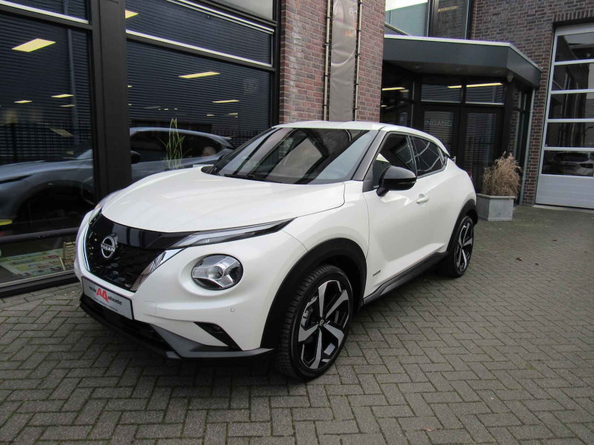 Nissan Juke Hybrid 143pk Tekna Automaat / 19-inch / Cold Pack / Navigatie