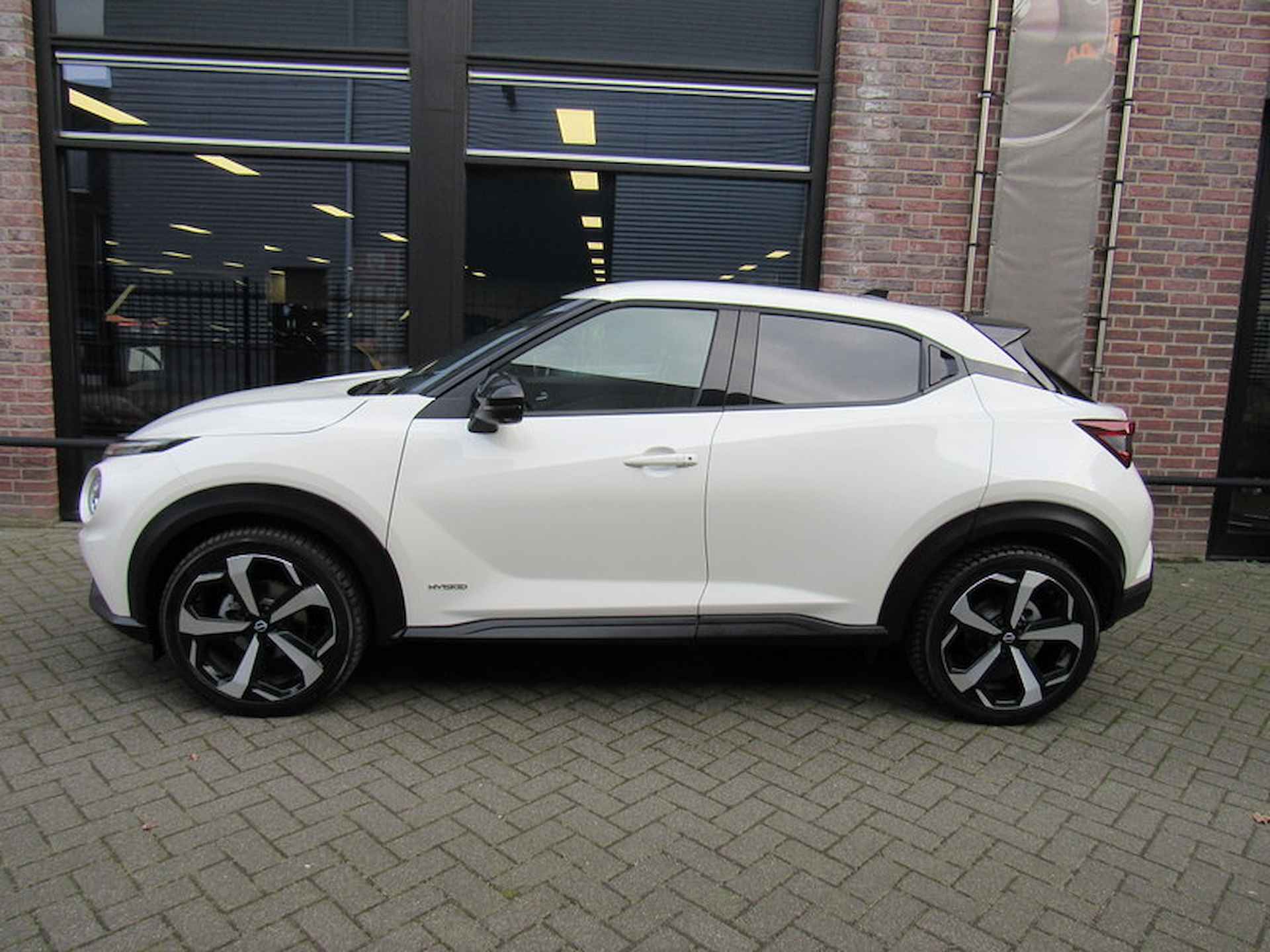 Nissan Juke Hybrid 143pk Tekna Automaat / 19-inch / Cold Pack / Navigatie - 2/33