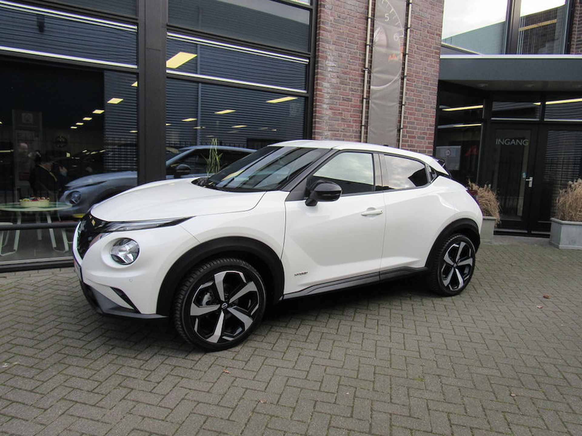 Nissan Juke Hybrid 143pk Tekna Automaat / 19-inch / Cold Pack / Navigatie - 3/33