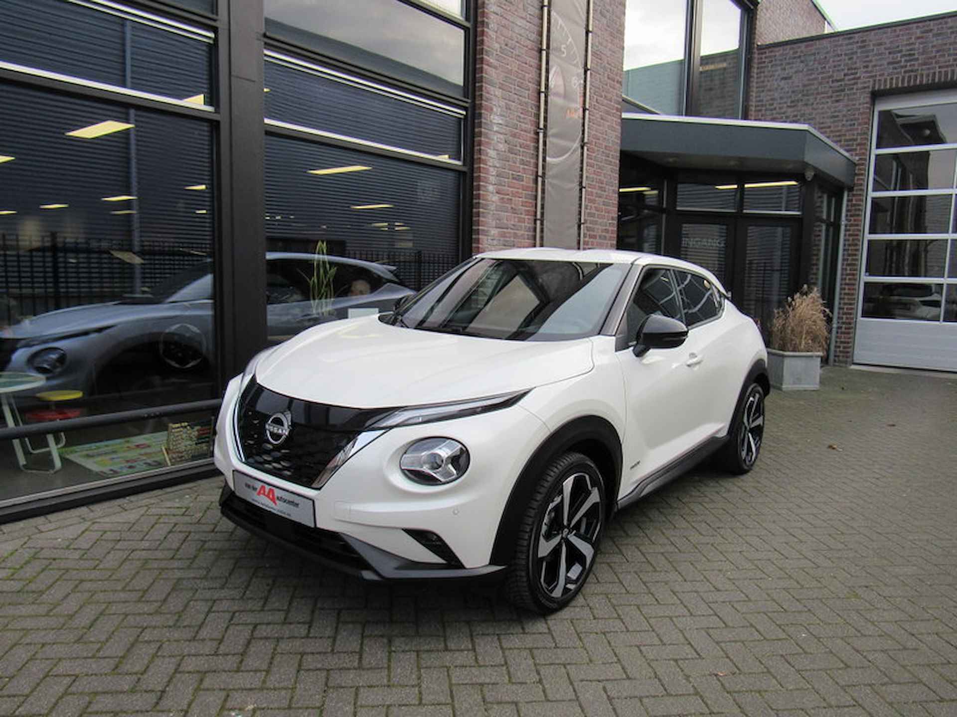 Nissan Juke Hybrid 143pk Tekna Automaat / 19-inch / Cold Pack / Navigatie - 4/33