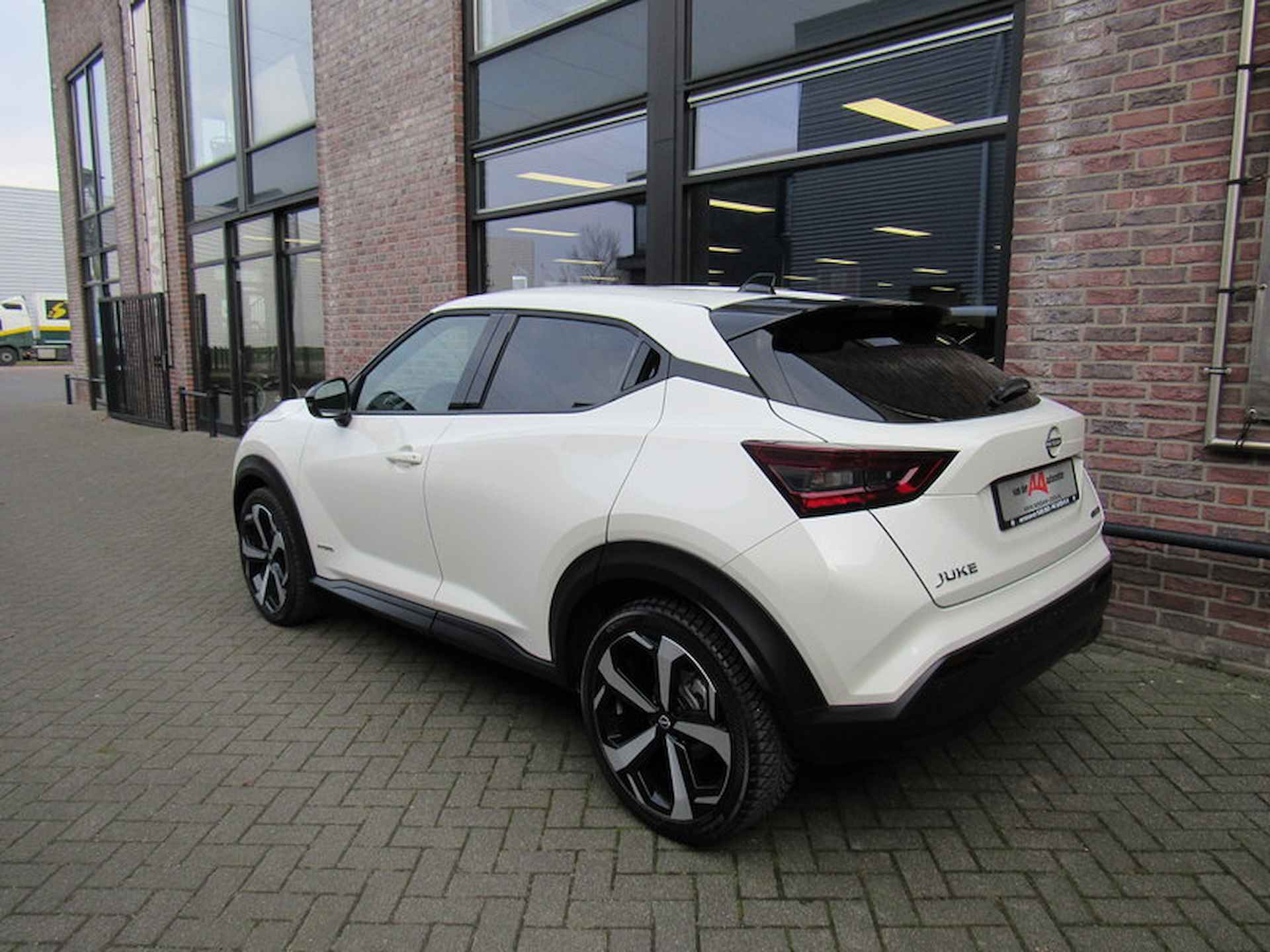 Nissan Juke Hybrid 143pk Tekna Automaat / 19-inch / Cold Pack / Navigatie - 8/33